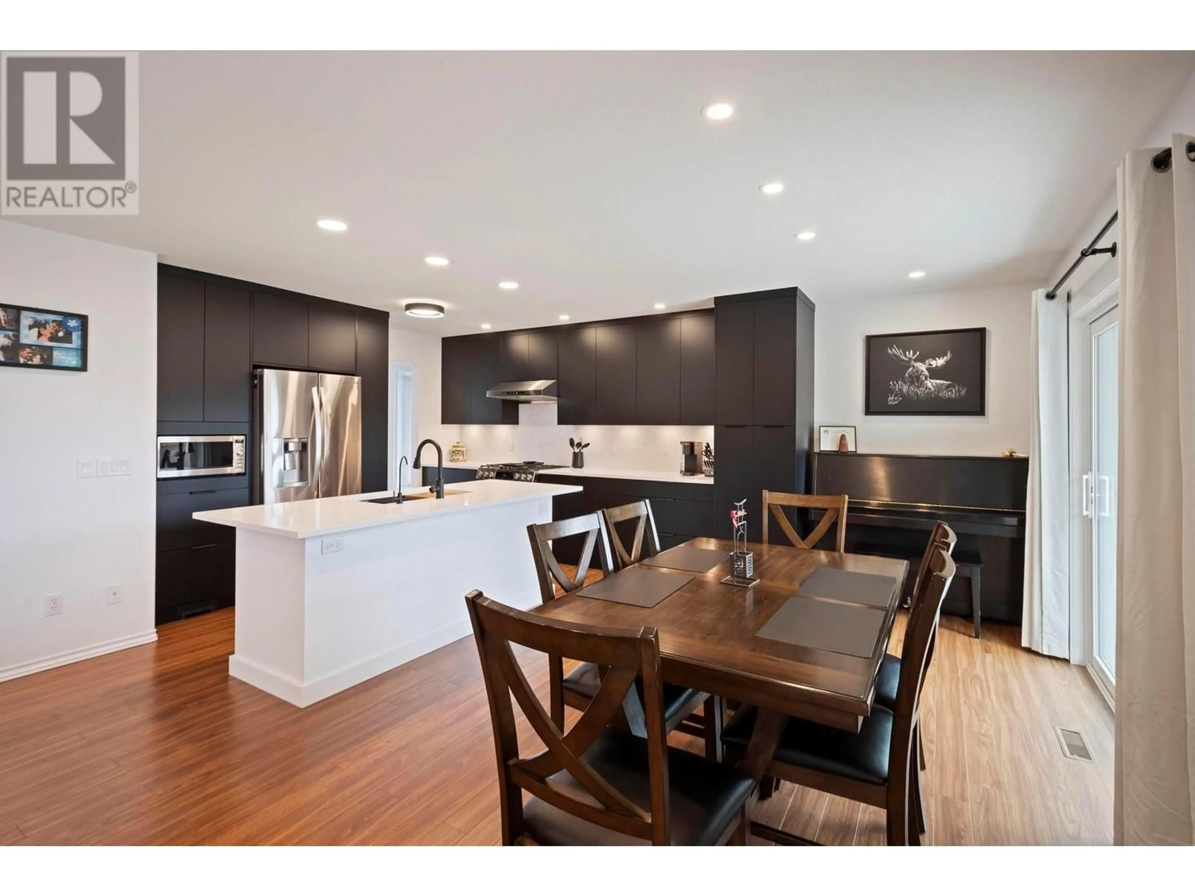 Open concept kitchen, wood/laminate floor for 3149 SHETLER DRIVE, West Kelowna British Columbia V4T1M4