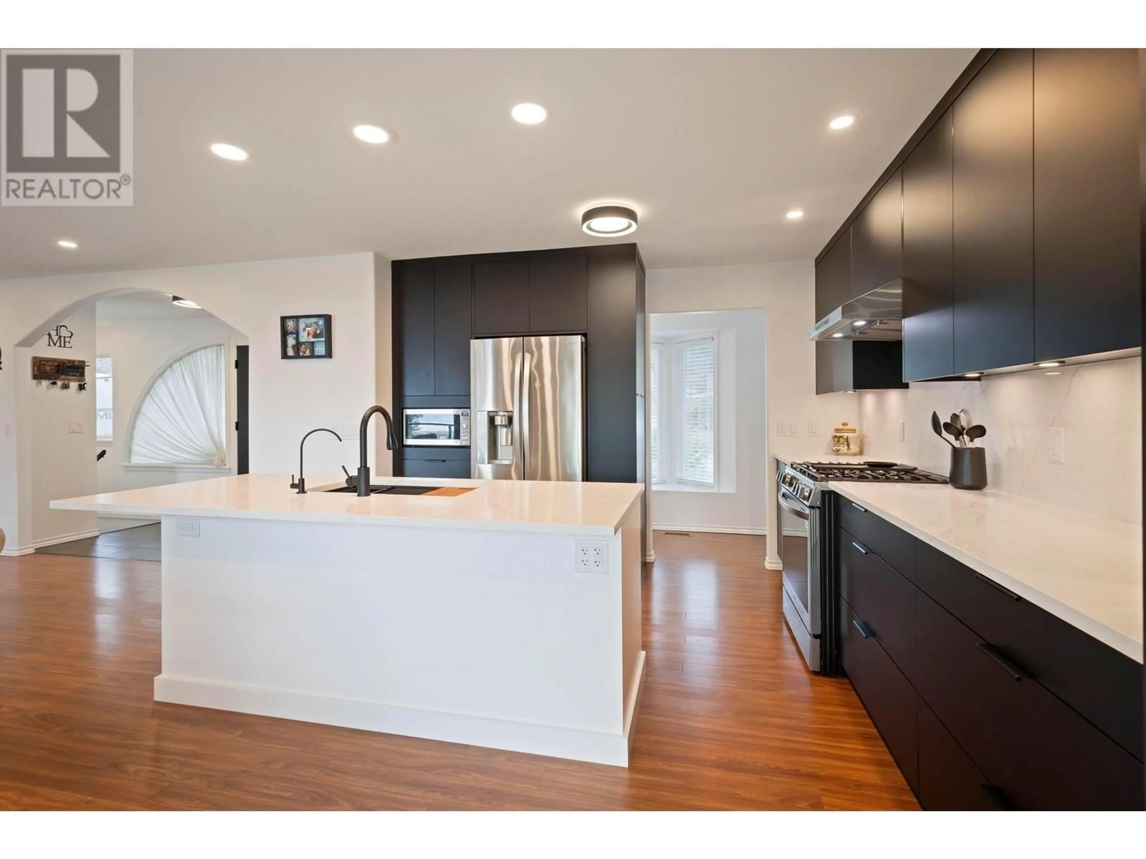 Open concept kitchen, wood/laminate floor for 3149 SHETLER DRIVE, West Kelowna British Columbia V4T1M4
