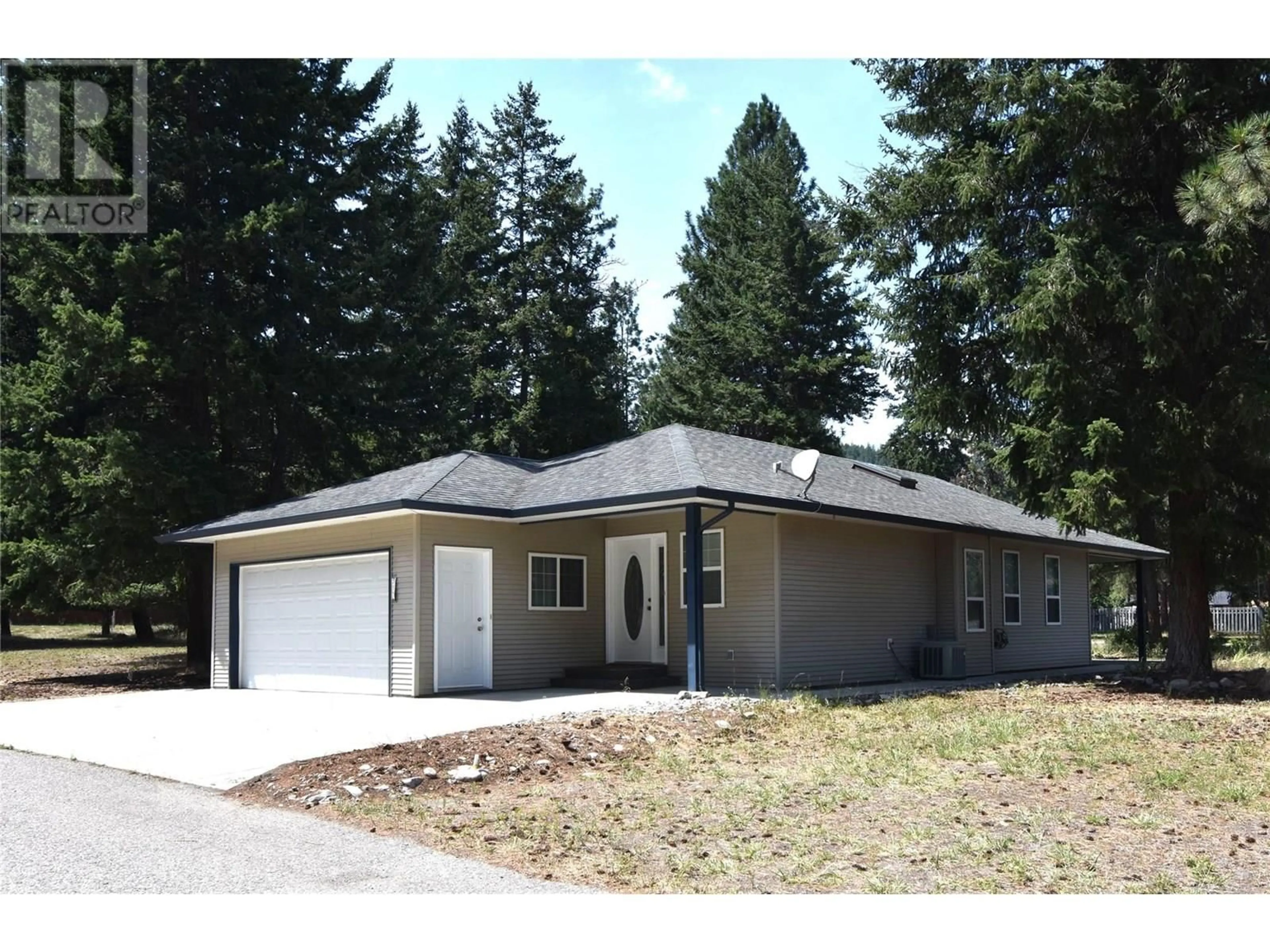 Home with vinyl exterior material, street for 312 GROUSE AVENUE, Vernon British Columbia V1H2A1