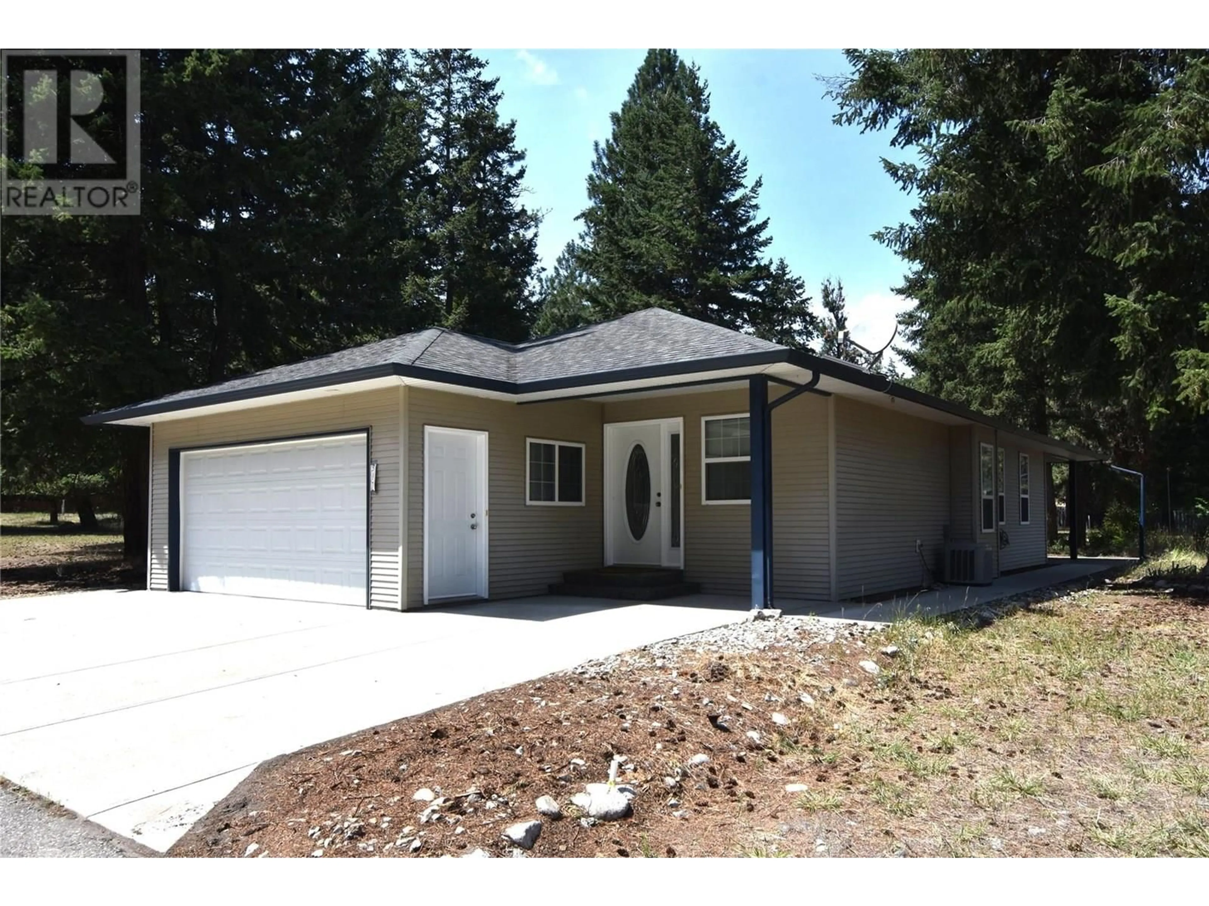Home with vinyl exterior material, street for 312 GROUSE AVENUE, Vernon British Columbia V1H2A1