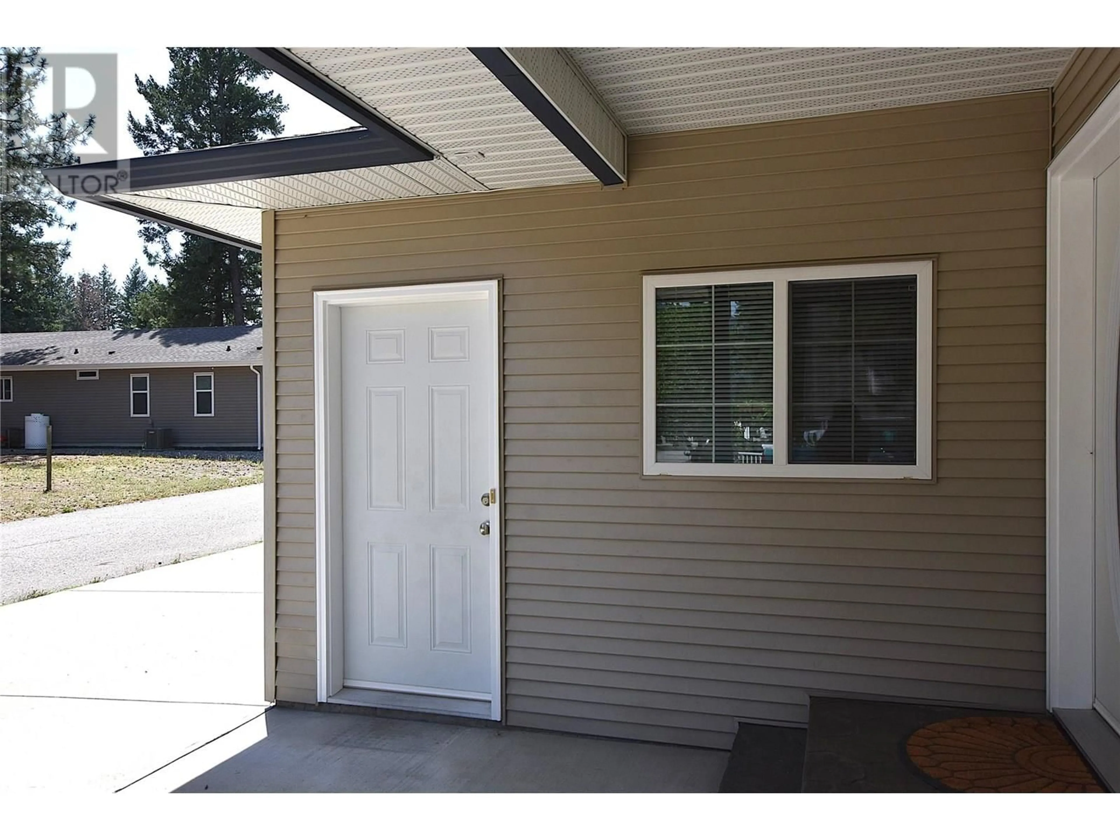 Home with vinyl exterior material, street for 312 GROUSE AVENUE, Vernon British Columbia V1H2A1