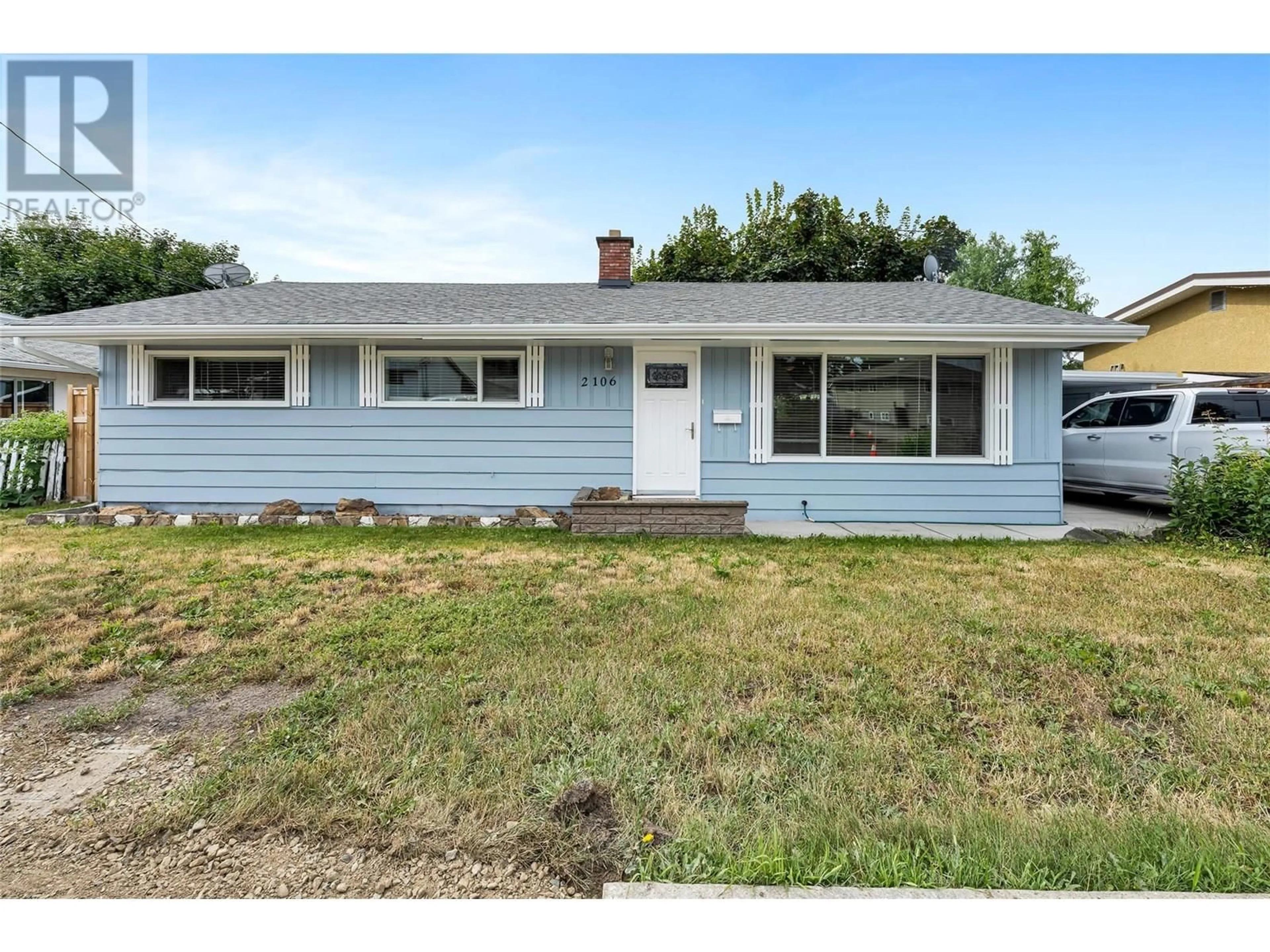 Home with vinyl exterior material, street for 2106 42 AVENUE, Vernon British Columbia V1T3J3