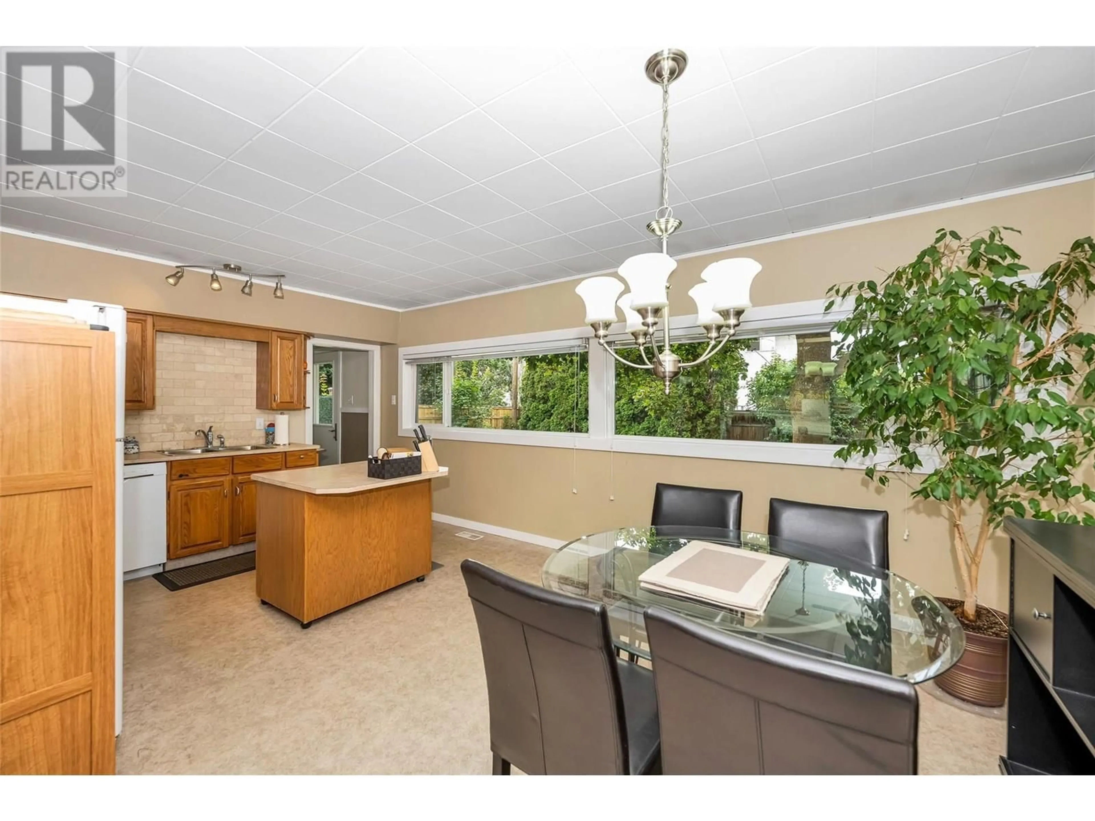 Open concept kitchen, ceramic/tile floor for 2106 42 AVENUE, Vernon British Columbia V1T3J3
