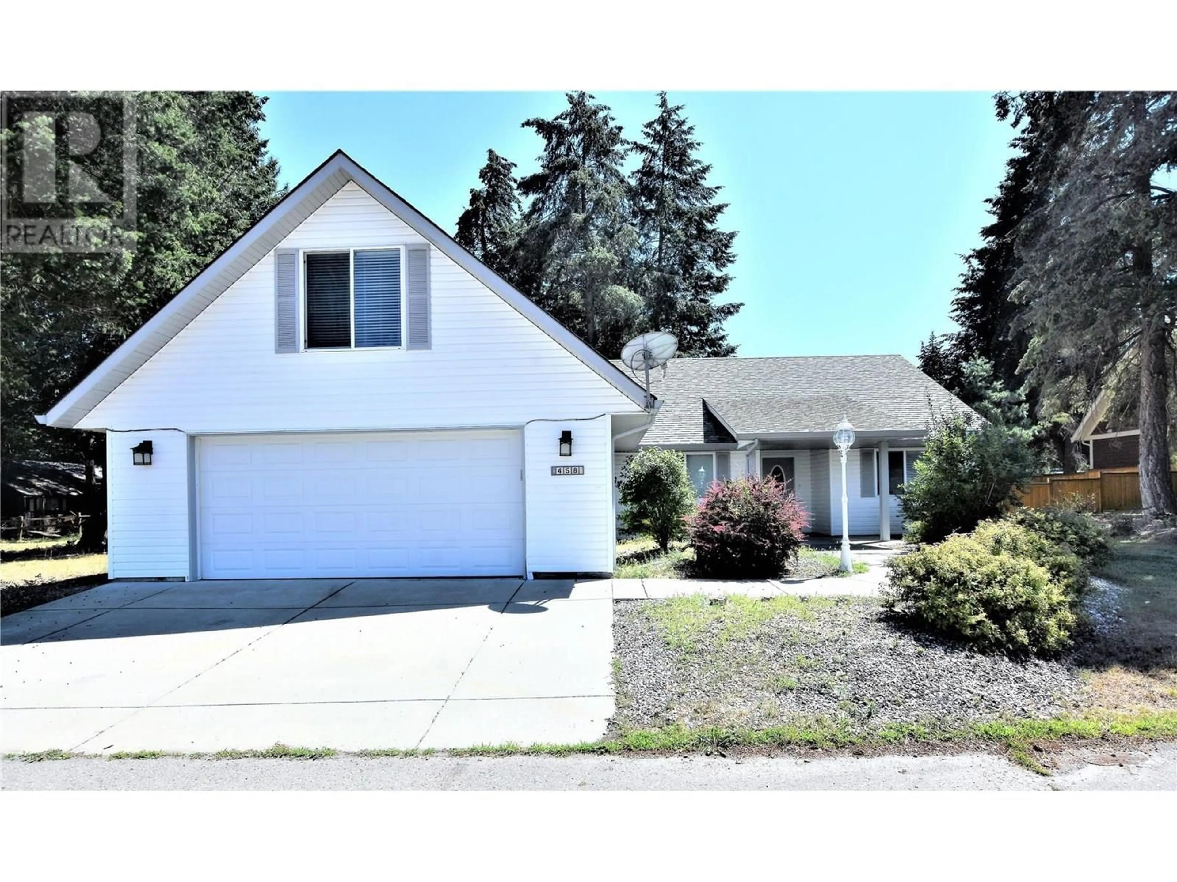 Home with vinyl exterior material, street for 458 IBIS AVENUE, Vernon British Columbia V1H2A1