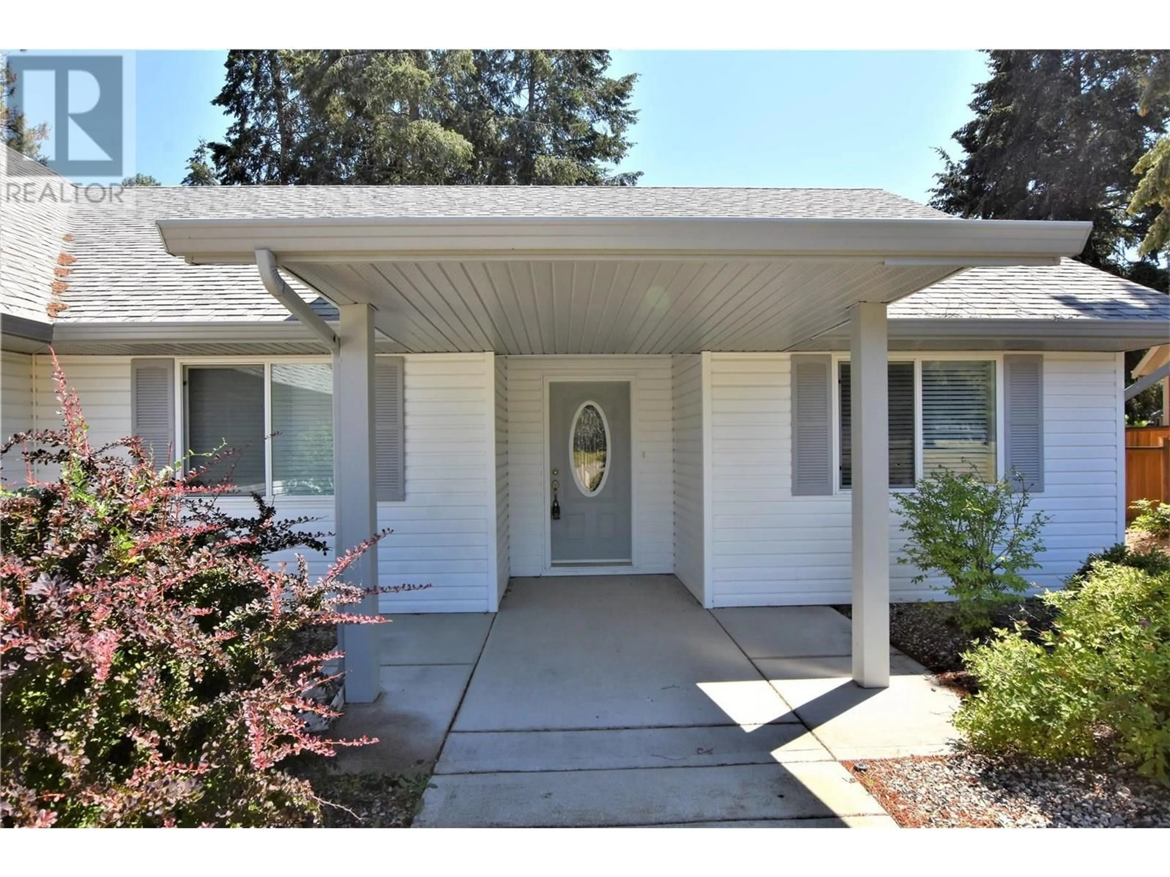 Home with vinyl exterior material, street for 458 IBIS AVENUE, Vernon British Columbia V1H2A1
