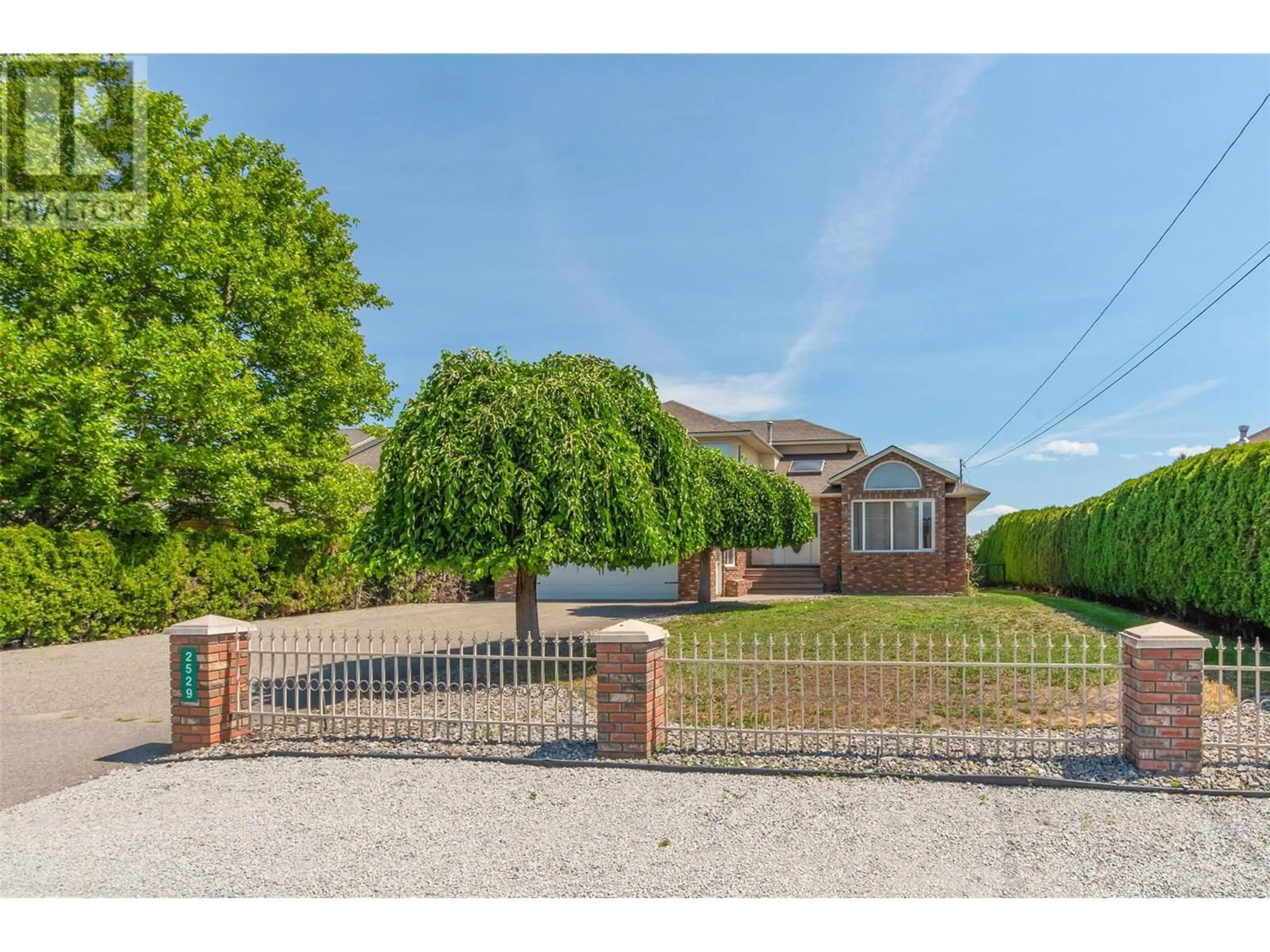 A pic from outside/outdoor area/front of a property/back of a property/a pic from drone, street for 2529 THACKER DRIVE, West Kelowna British Columbia V1Z1W2