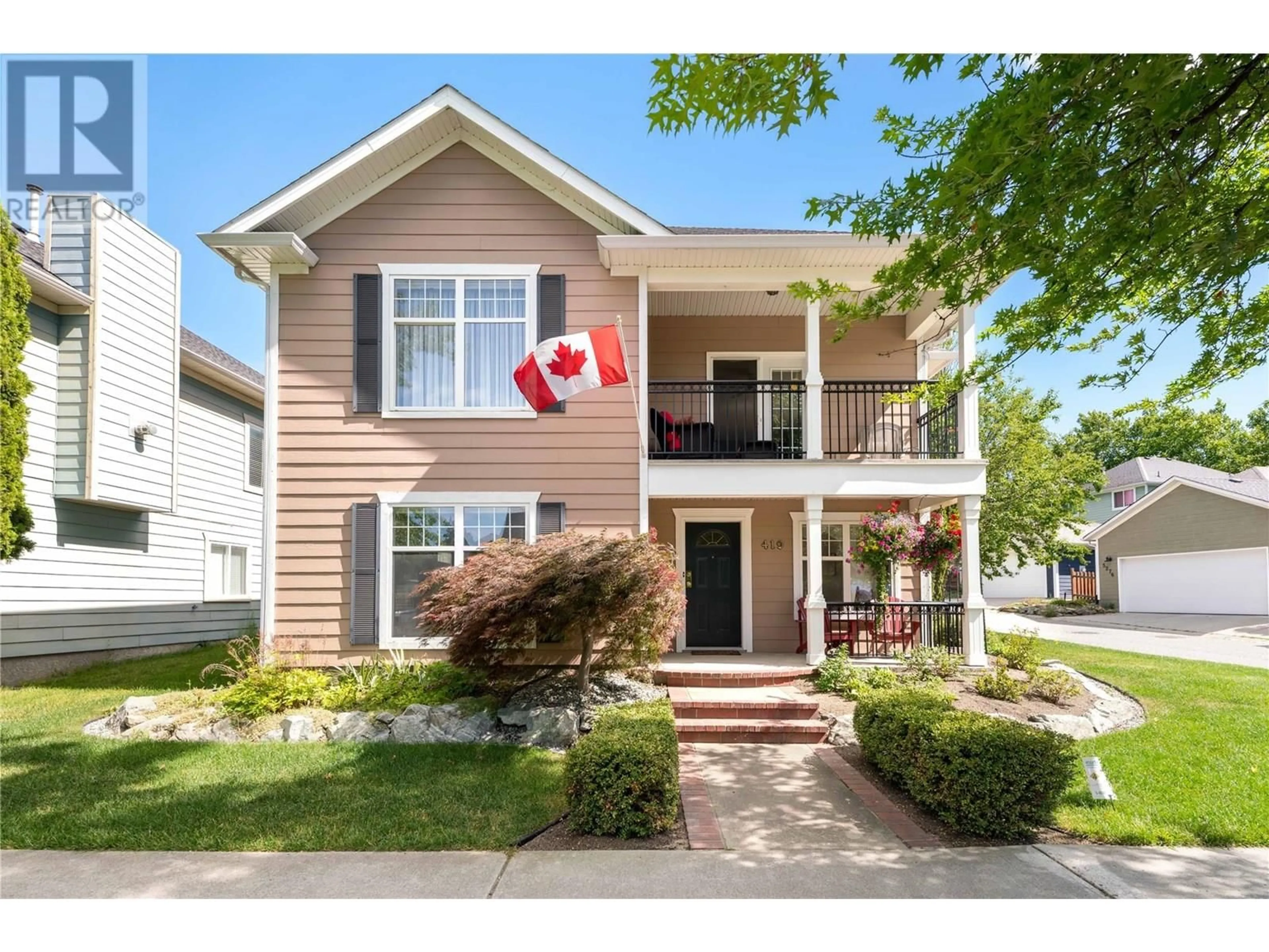 Home with vinyl exterior material, street for 419 PROVIDENCE AVENUE, Kelowna British Columbia V1W4S8