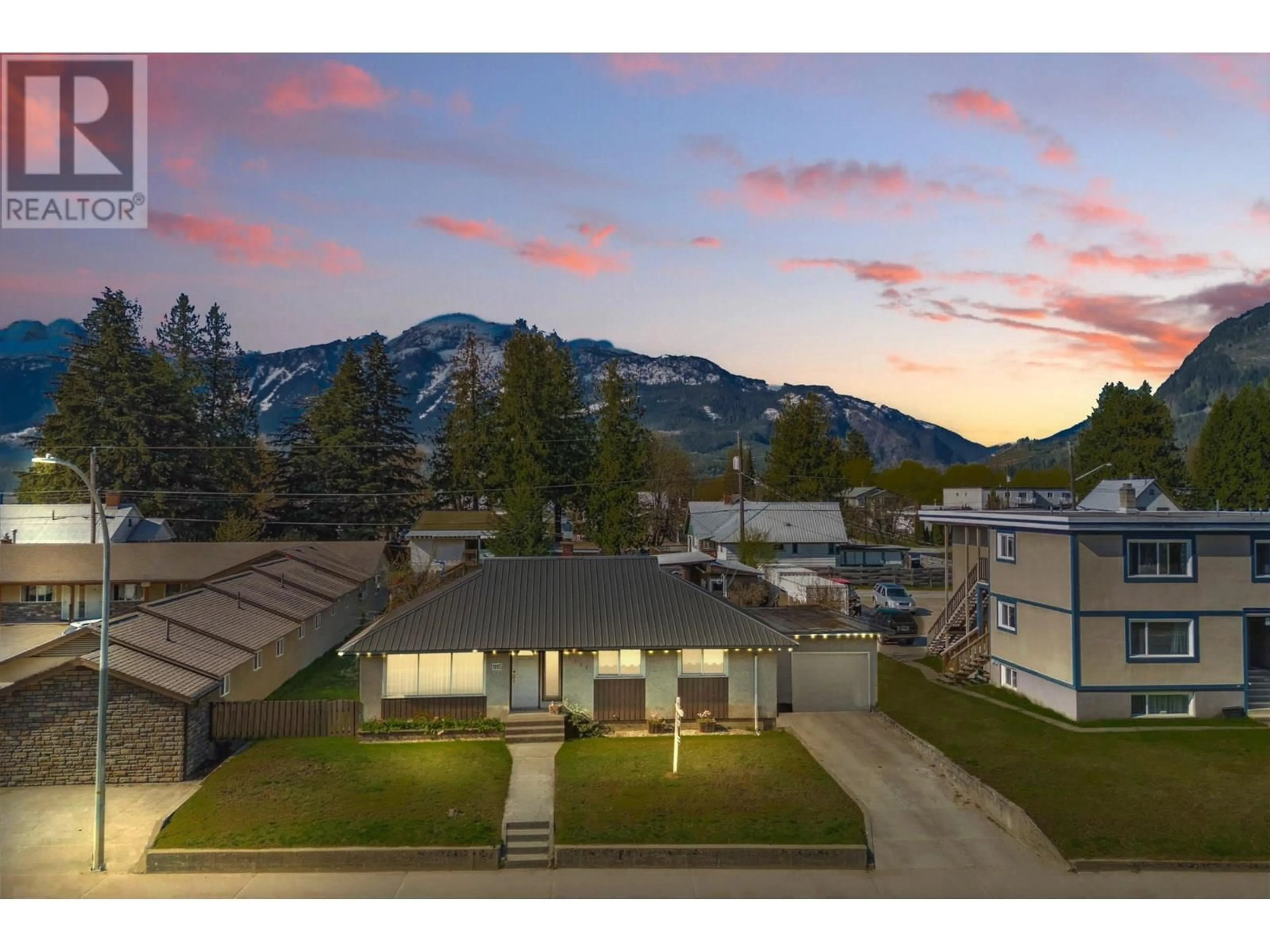 A pic from outside/outdoor area/front of a property/back of a property/a pic from drone, mountain view for 1115 VICTORIA ROAD WEST, Revelstoke British Columbia V0E2S0