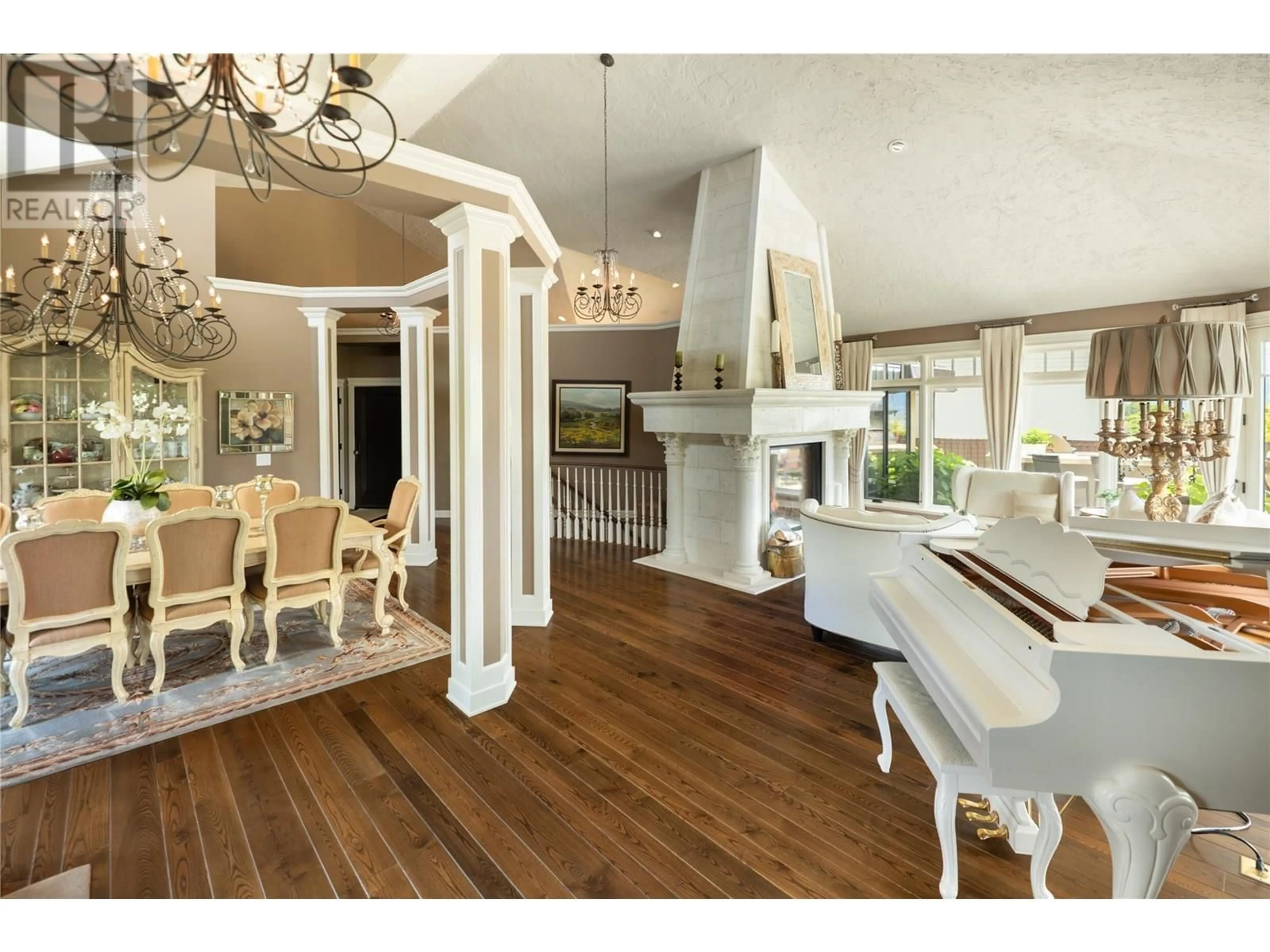 Open concept kitchen, wood/laminate floor for 4768 CARMEL CRESCENT, Kelowna British Columbia V1W5B9