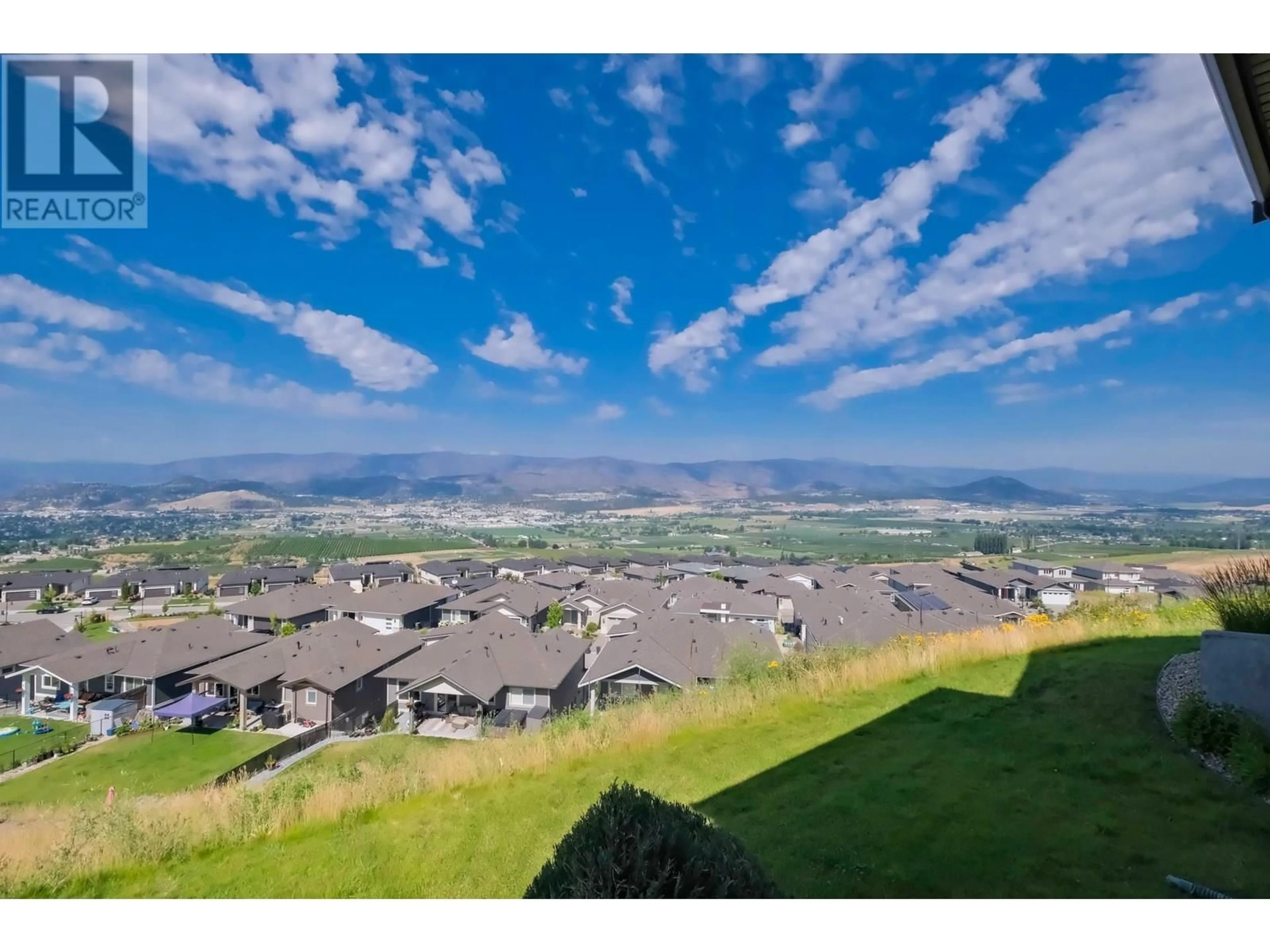 A pic from outside/outdoor area/front of a property/back of a property/a pic from drone, mountain view for 5 - 1836 TOWER RANCH BOULEVARD, Kelowna British Columbia V1P1S8