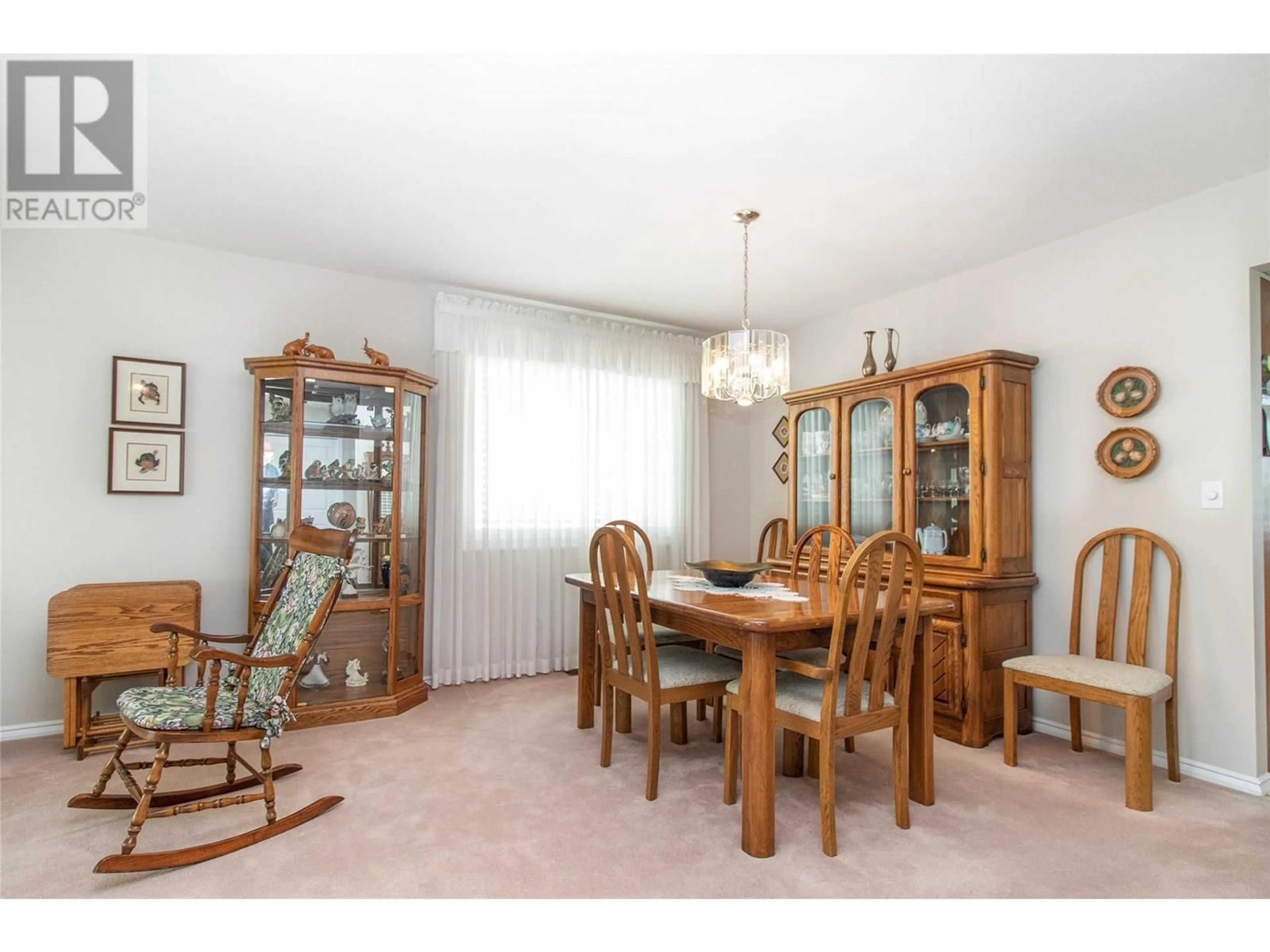 Dining room, wood/laminate floor for 1052 WINTERGREEN DRIVE, Kelowna British Columbia V1W3V7