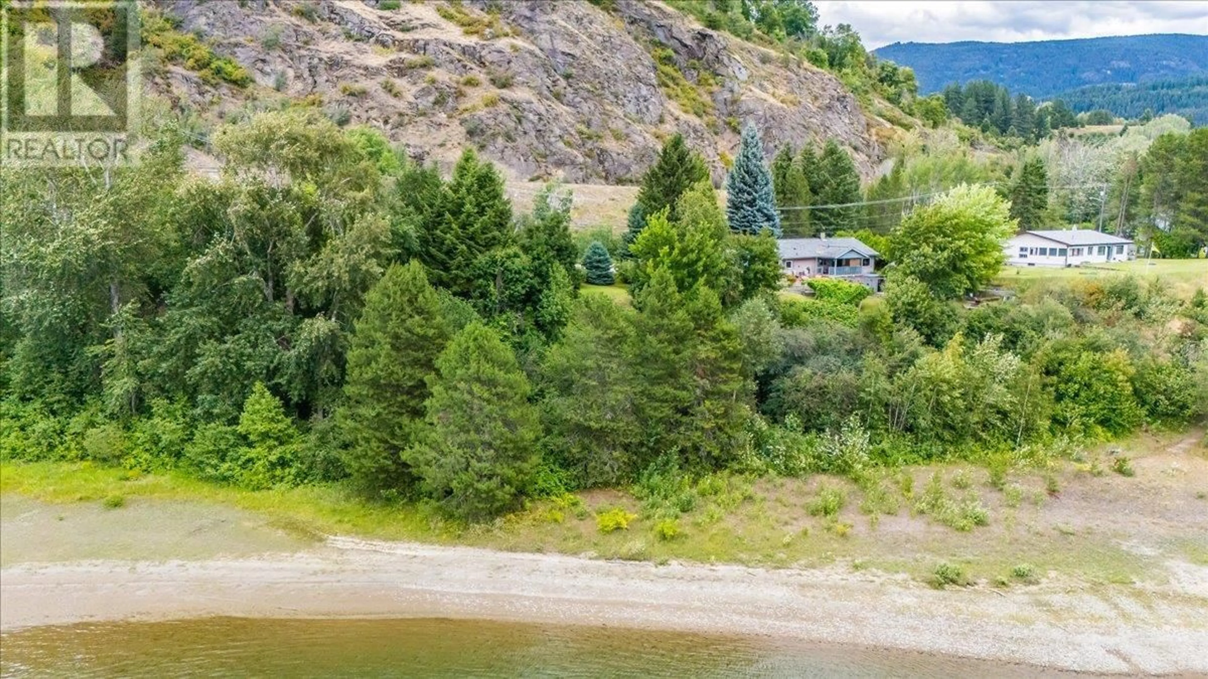A pic from outside/outdoor area/front of a property/back of a property/a pic from drone, water/lake/river/ocean view for 1986 BRILLIANT ROAD, Castlegar British Columbia V1N4M2