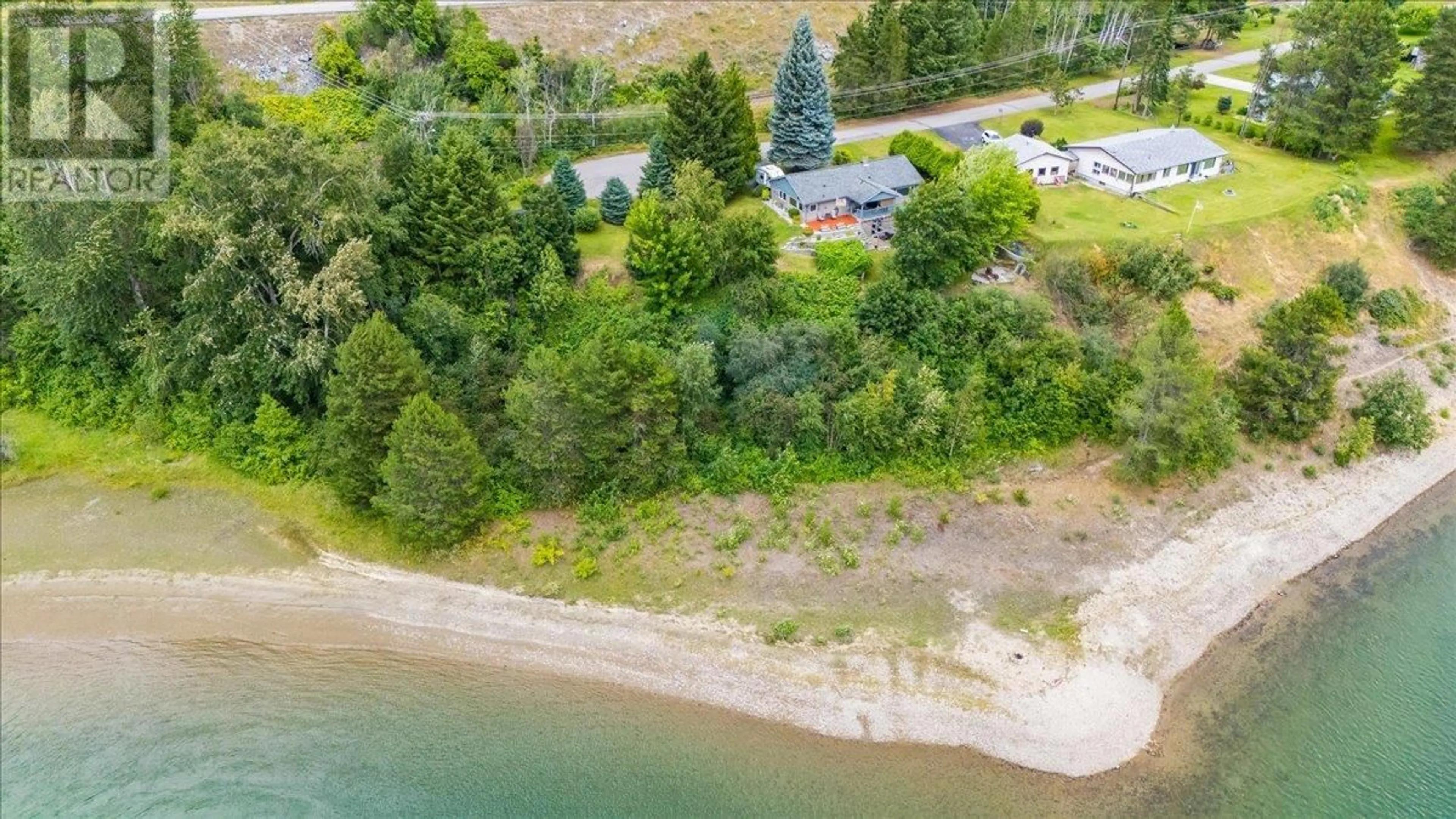 A pic from outside/outdoor area/front of a property/back of a property/a pic from drone, water/lake/river/ocean view for 1986 BRILLIANT ROAD, Castlegar British Columbia V1N4M2