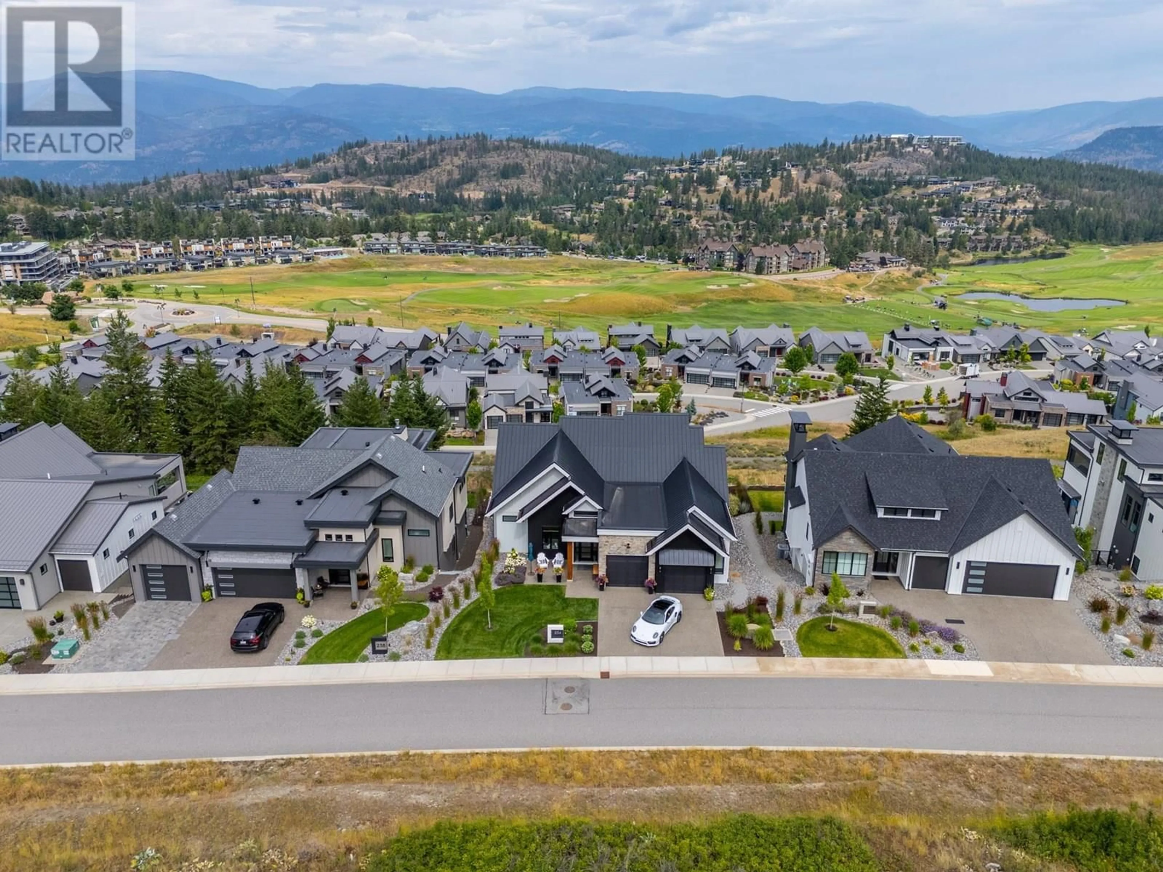 A pic from outside/outdoor area/front of a property/back of a property/a pic from drone, mountain view for 234 DIAMOND WAY, Vernon British Columbia V1H0A2