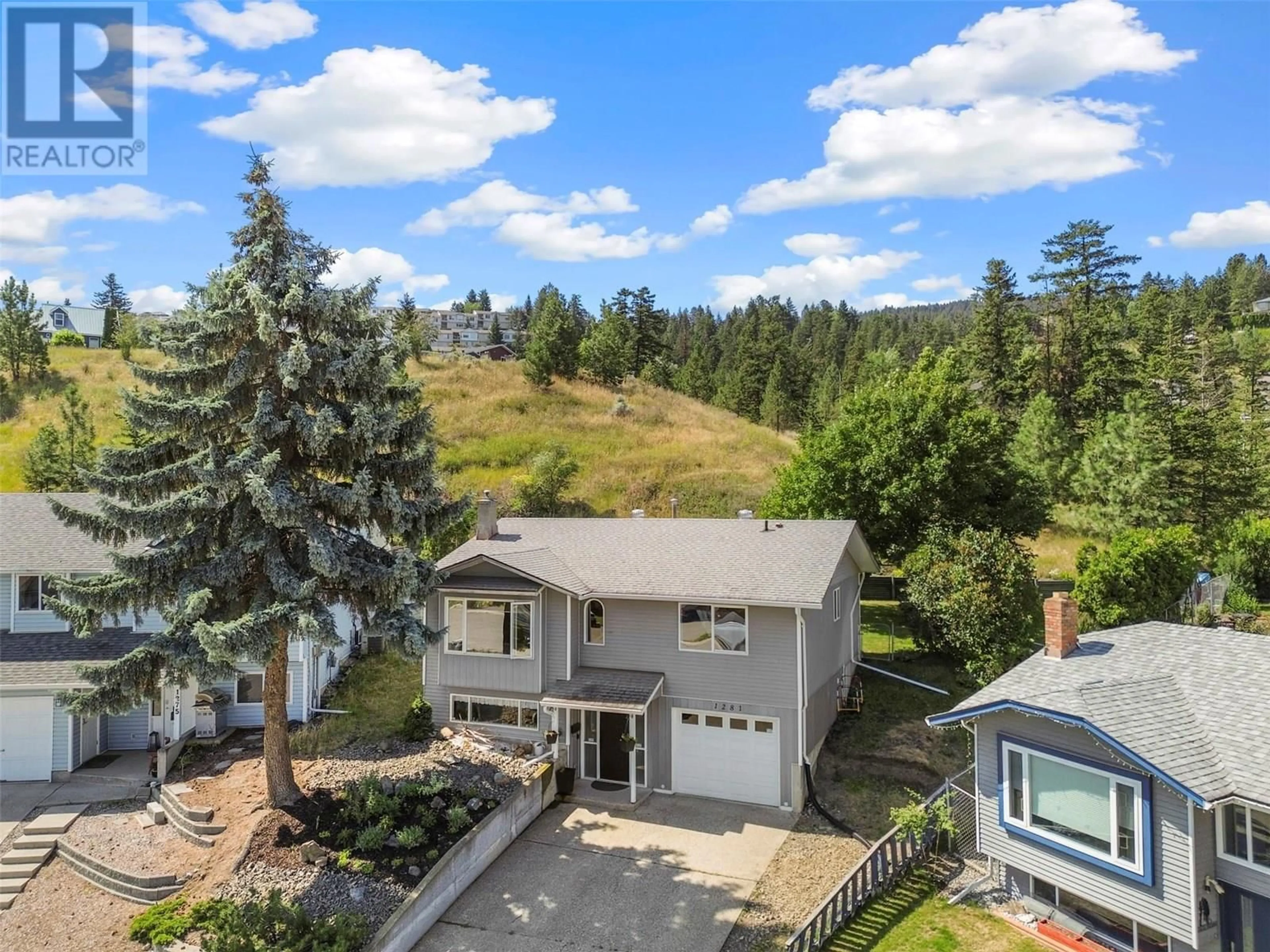 A pic from outside/outdoor area/front of a property/back of a property/a pic from drone, mountain view for 1281 HARRISON PLACE, Kamloops British Columbia V1S1M2
