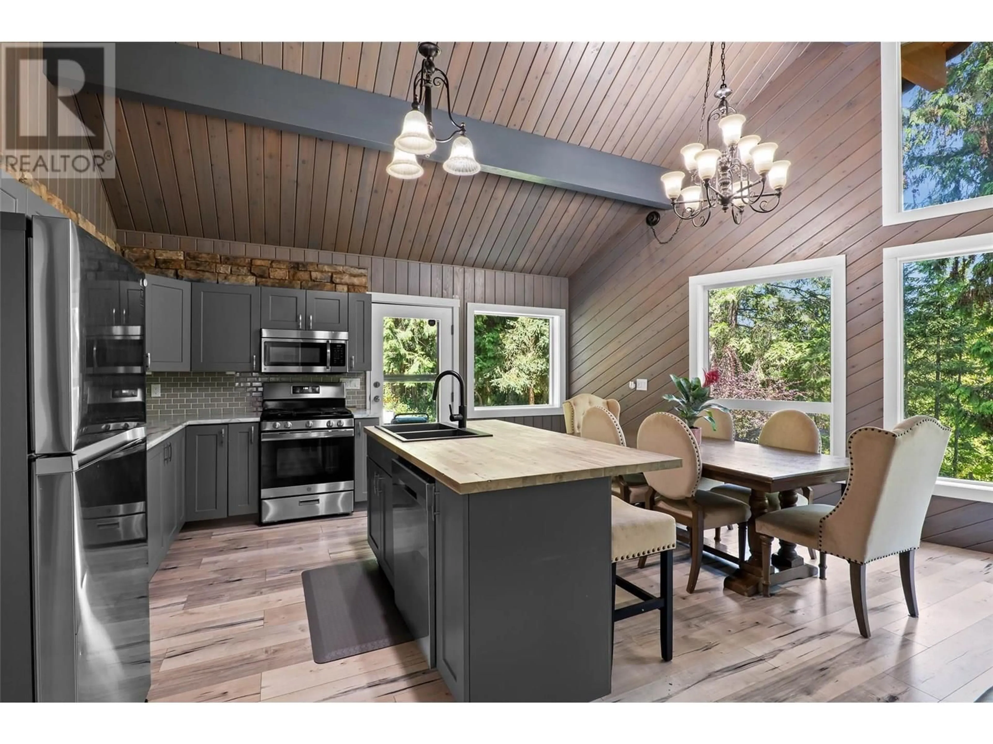Open concept kitchen, wood/laminate floor for 2616 DUNCAN ROAD, Blind Bay British Columbia
