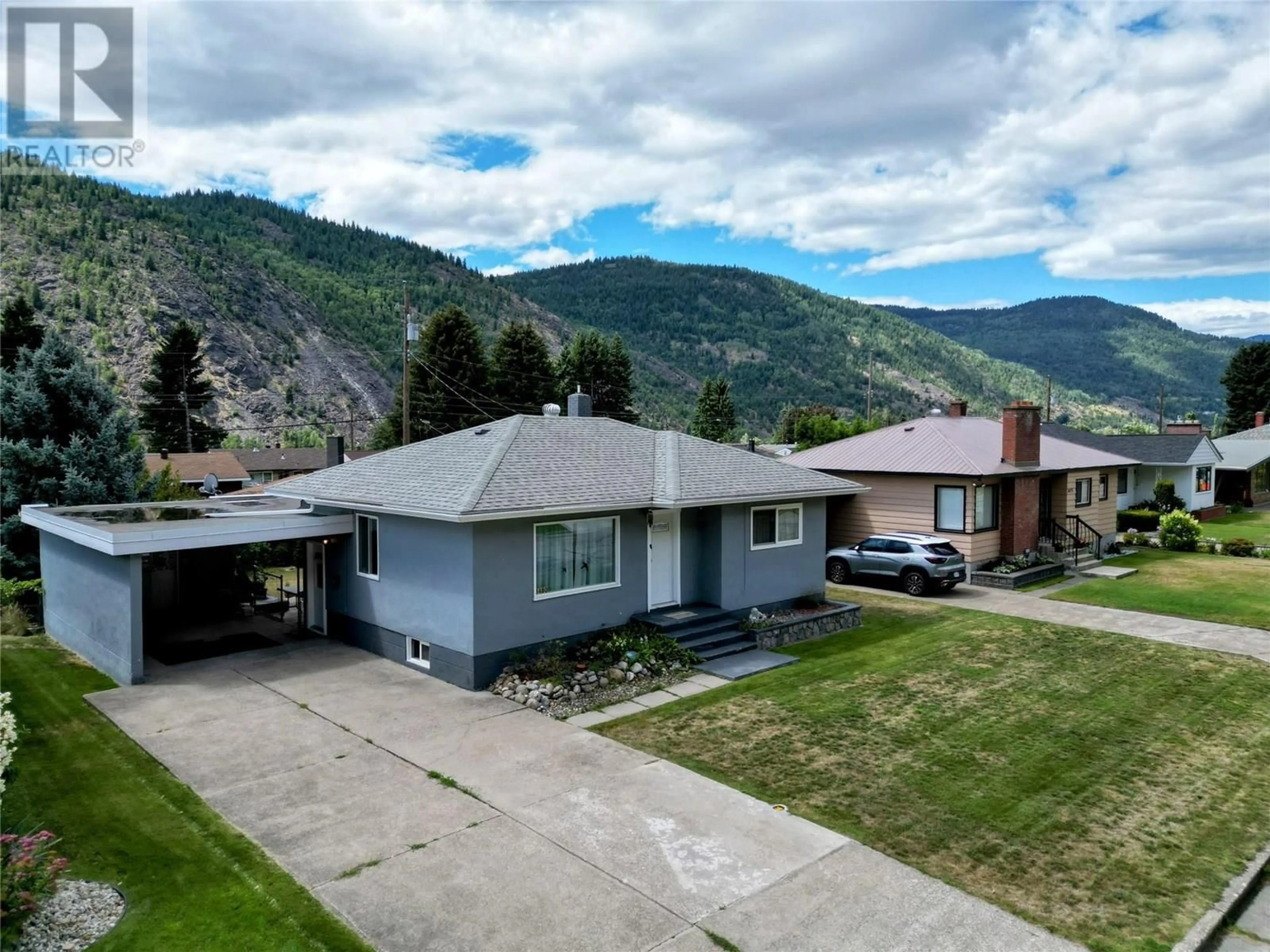A pic from outside/outdoor area/front of a property/back of a property/a pic from drone, mountain view for 3480 ASTER DRIVE, Trail British Columbia V1R2X3