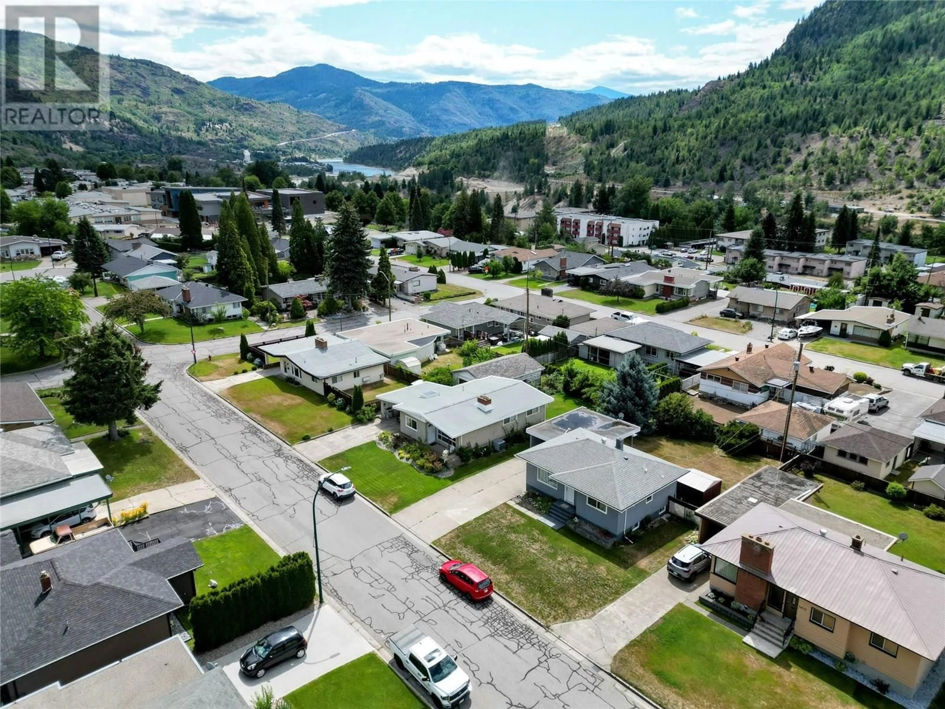 A pic from outside/outdoor area/front of a property/back of a property/a pic from drone, mountain view for 3480 ASTER DRIVE, Trail British Columbia V1R2X3