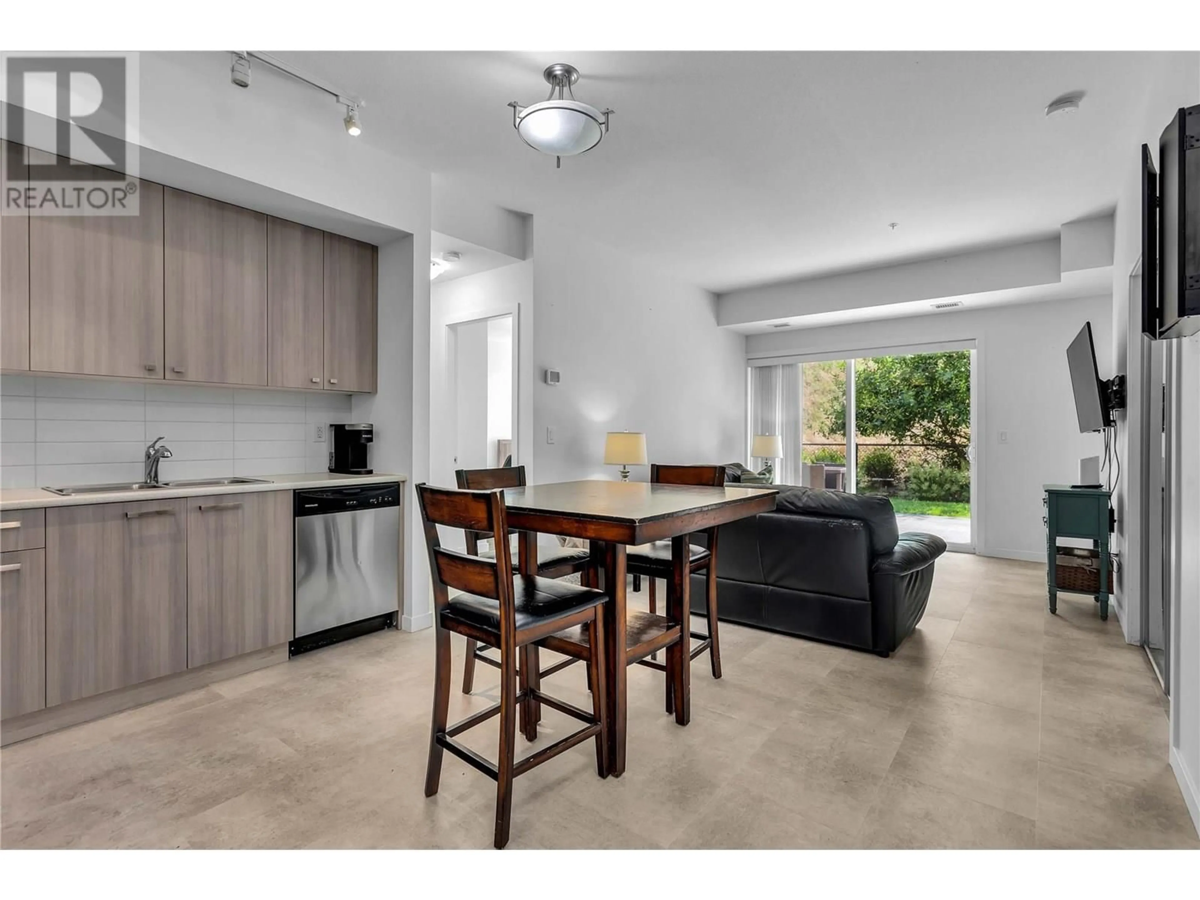 Open concept kitchen, unknown for 123 - 935 ACADEMY WAY, Kelowna British Columbia V1V3A9