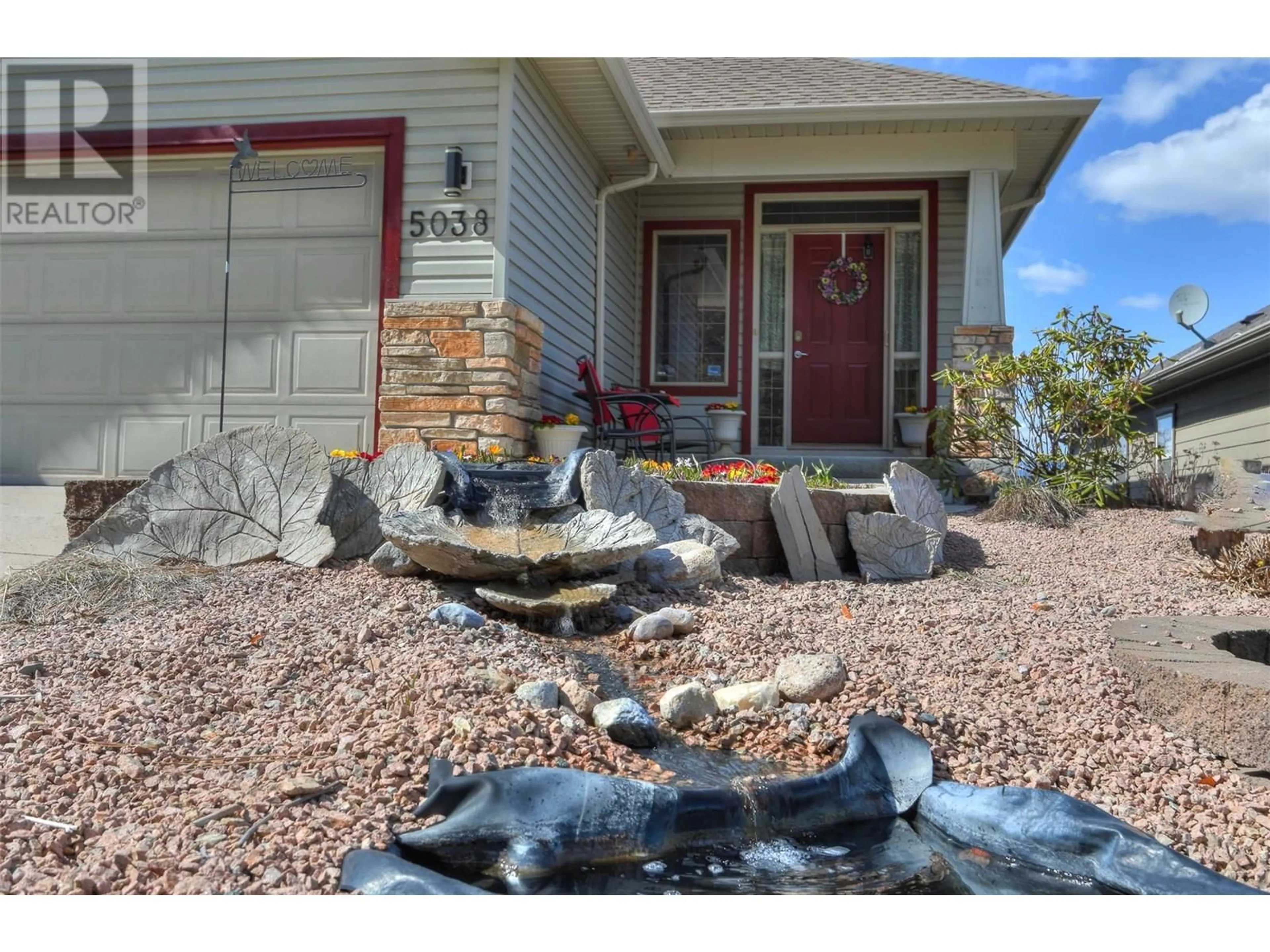Home with vinyl exterior material, street for 5038 SOUTH RIDGE DRIVE, Kelowna British Columbia V1W4W5