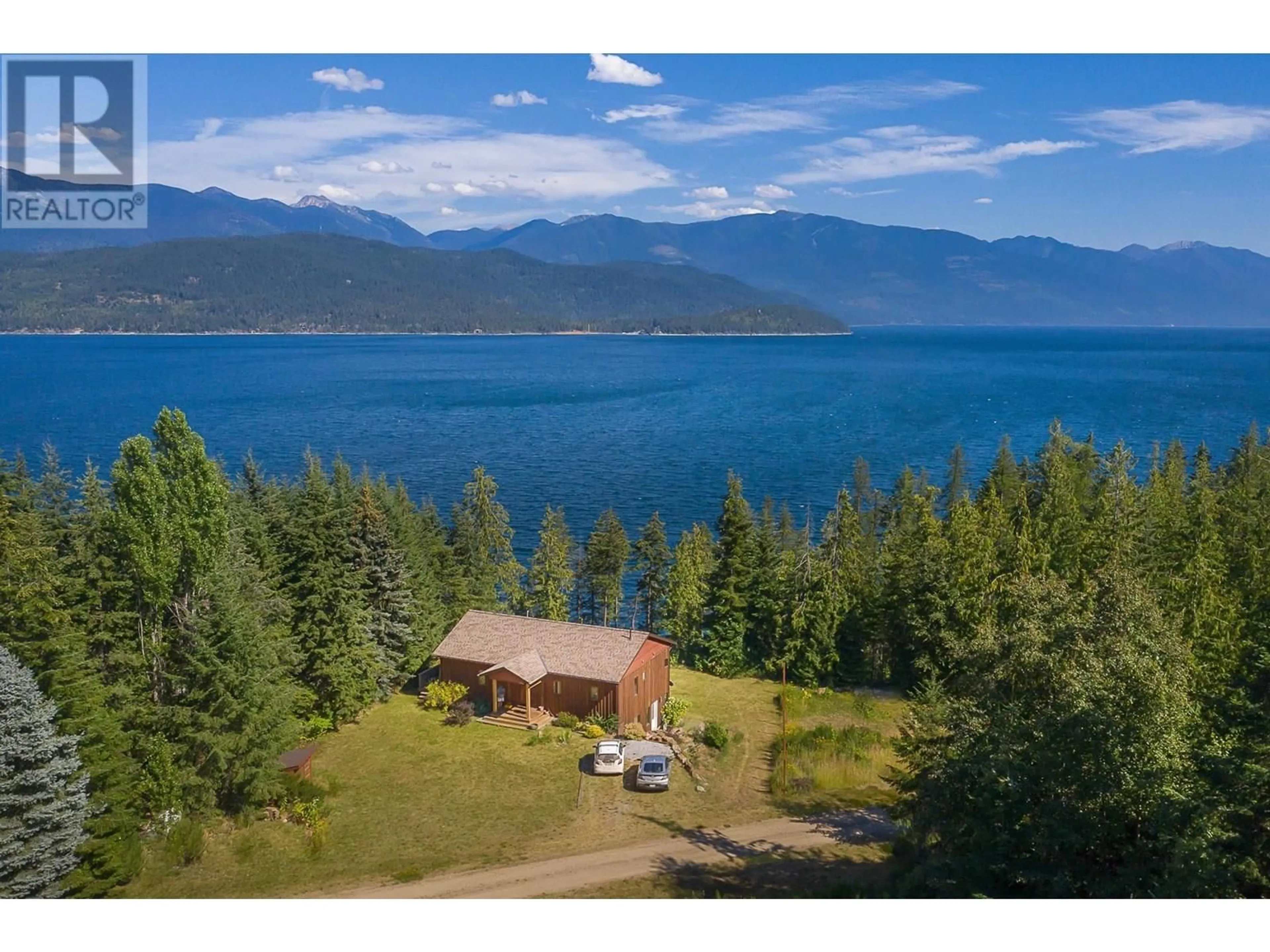 A pic from outside/outdoor area/front of a property/back of a property/a pic from drone, water/lake/river/ocean view for 2056 HIGHWAY 31 OTHER, Balfour British Columbia V1L7E8