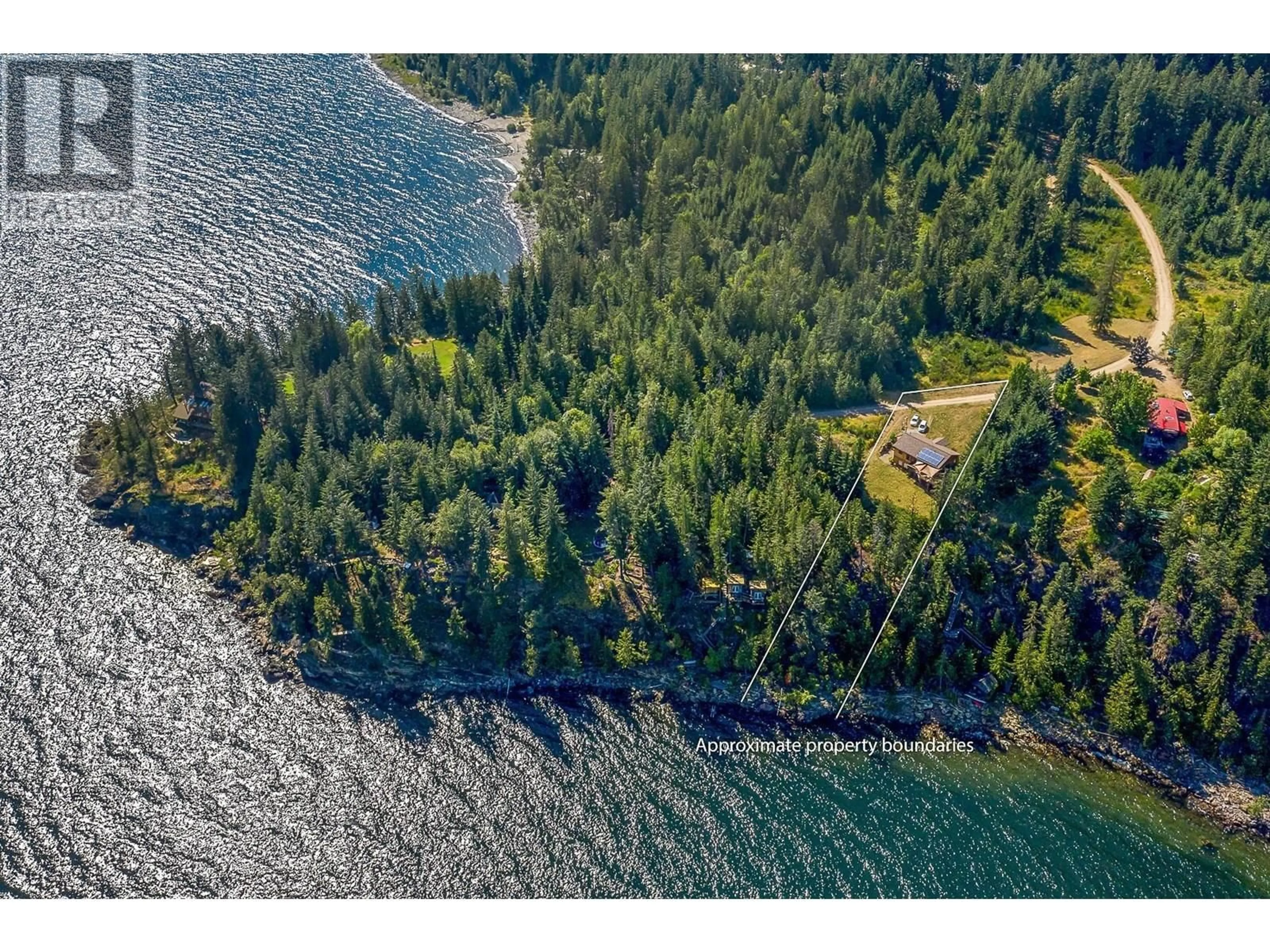 A pic from outside/outdoor area/front of a property/back of a property/a pic from drone, water/lake/river/ocean view for 2056 HIGHWAY 31 OTHER, Balfour British Columbia V1L7E8