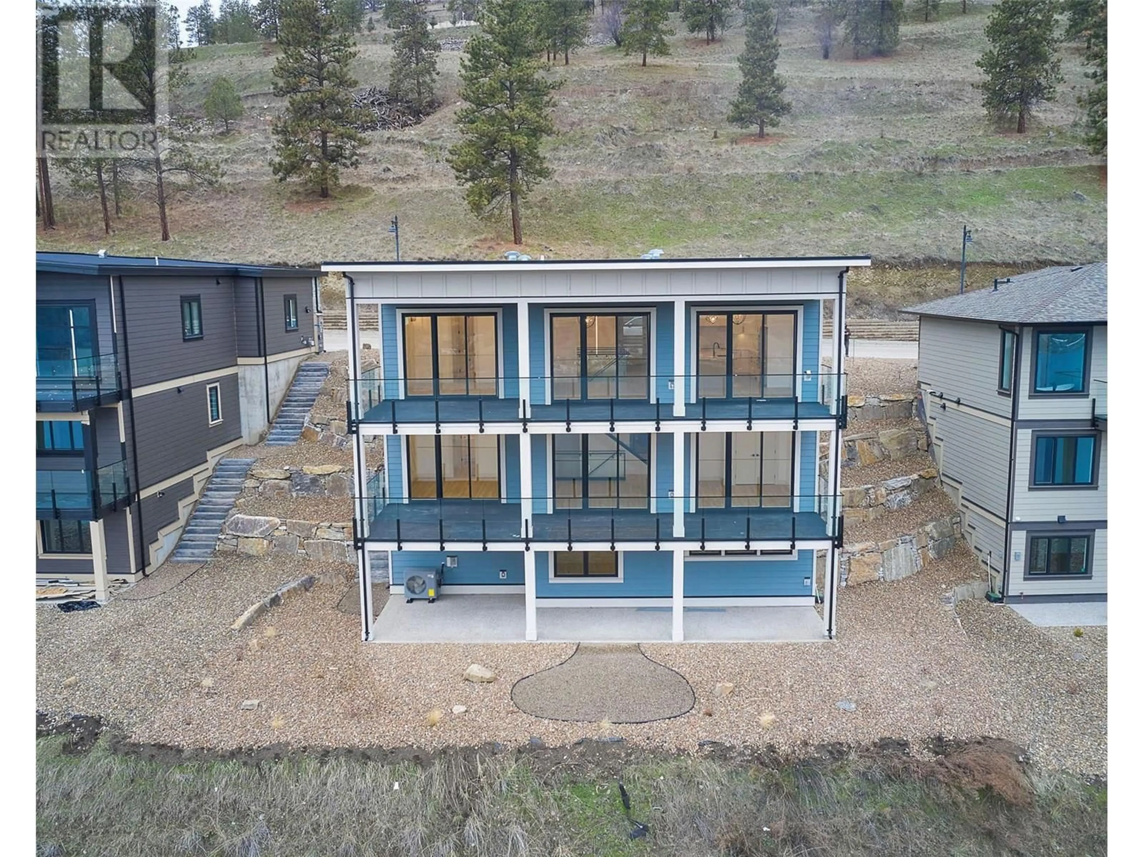 A pic from outside/outdoor area/front of a property/back of a property/a pic from drone, building for 8932 TAVISTOCK ROAD, Vernon British Columbia V1H2L4