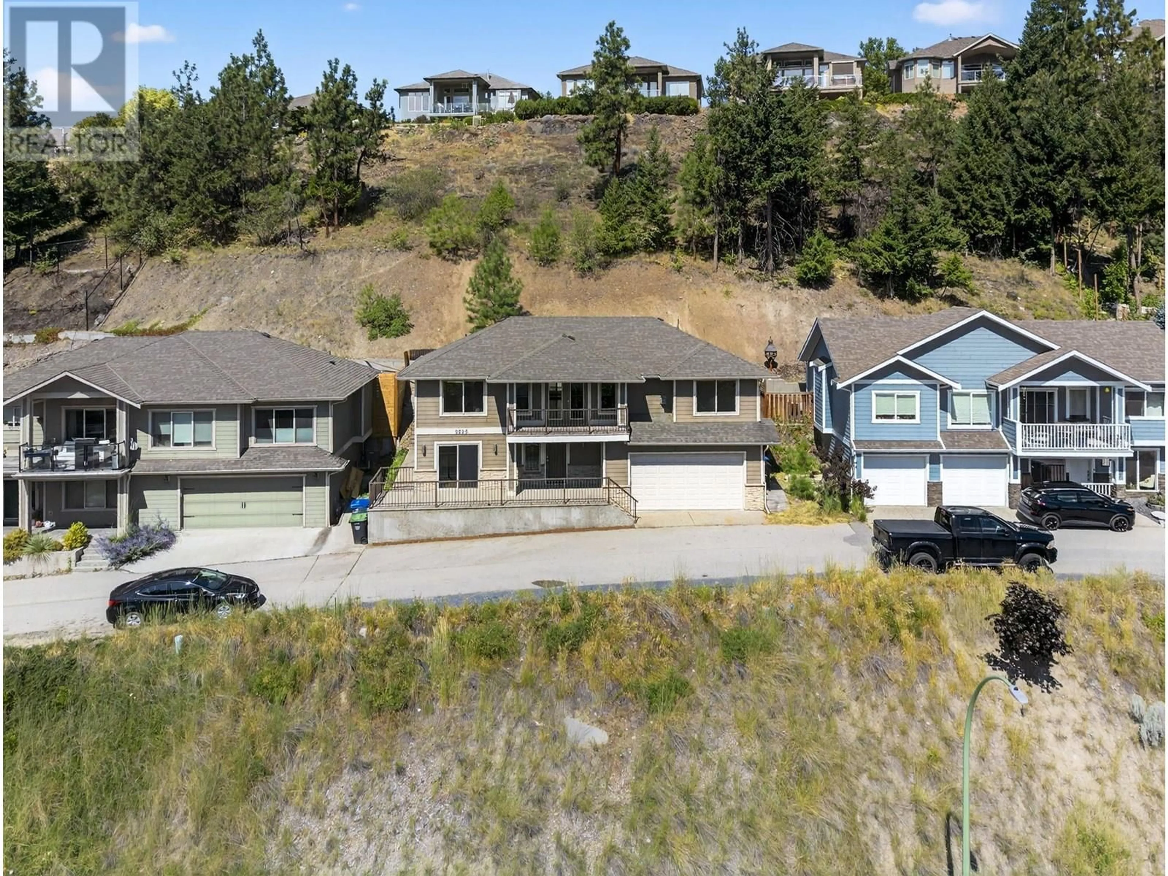 A pic from outside/outdoor area/front of a property/back of a property/a pic from drone, mountain view for 2225 SUNVIEW DRIVE, West Kelowna British Columbia V1Z4B9