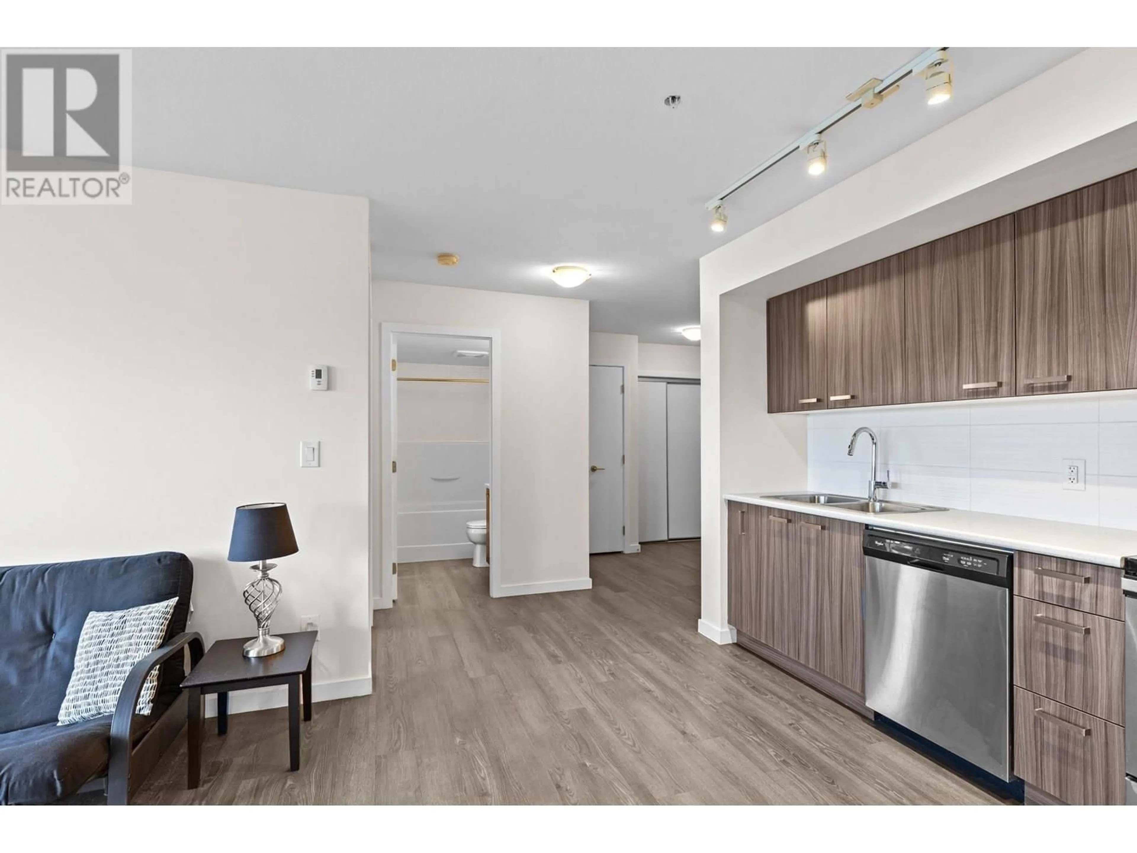 Standard kitchen, wood/laminate floor for 107 - 775 ACADEMY WAY, Kelowna British Columbia V4C2C6