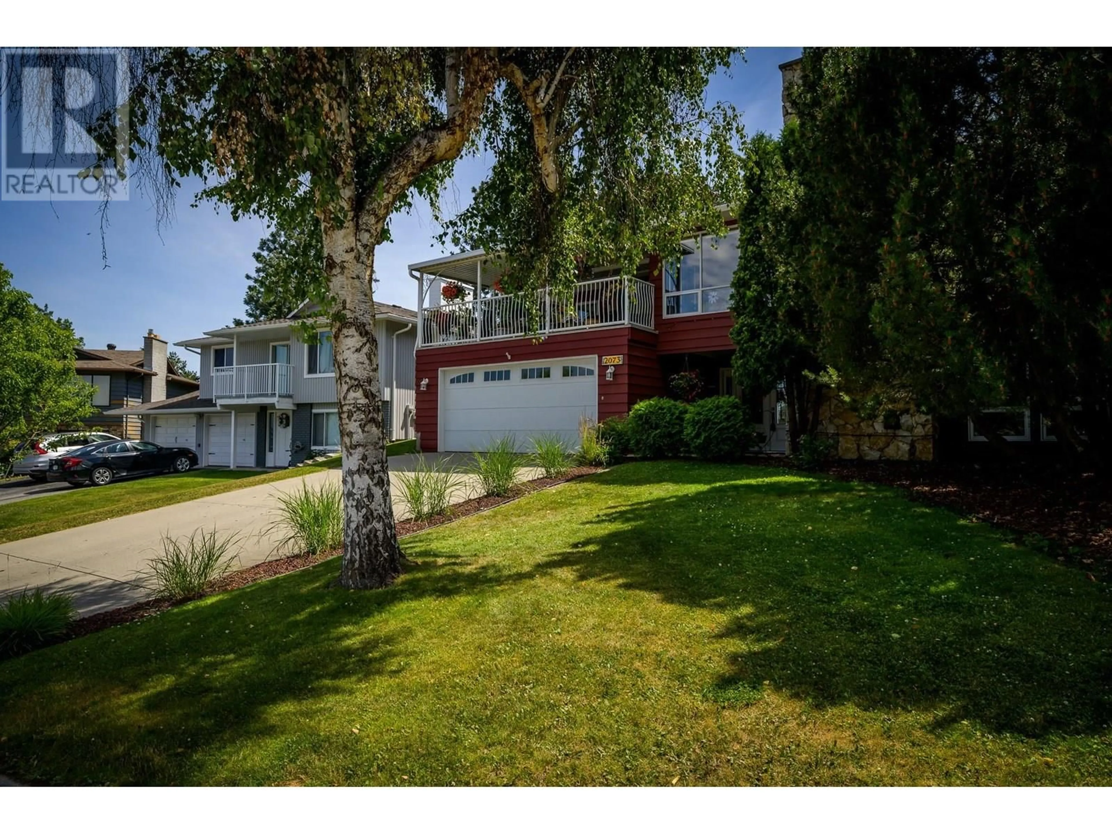 A pic from outside/outdoor area/front of a property/back of a property/a pic from drone, street for 2073 HOLYROOD PLACE, Kamloops British Columbia V1S1E7