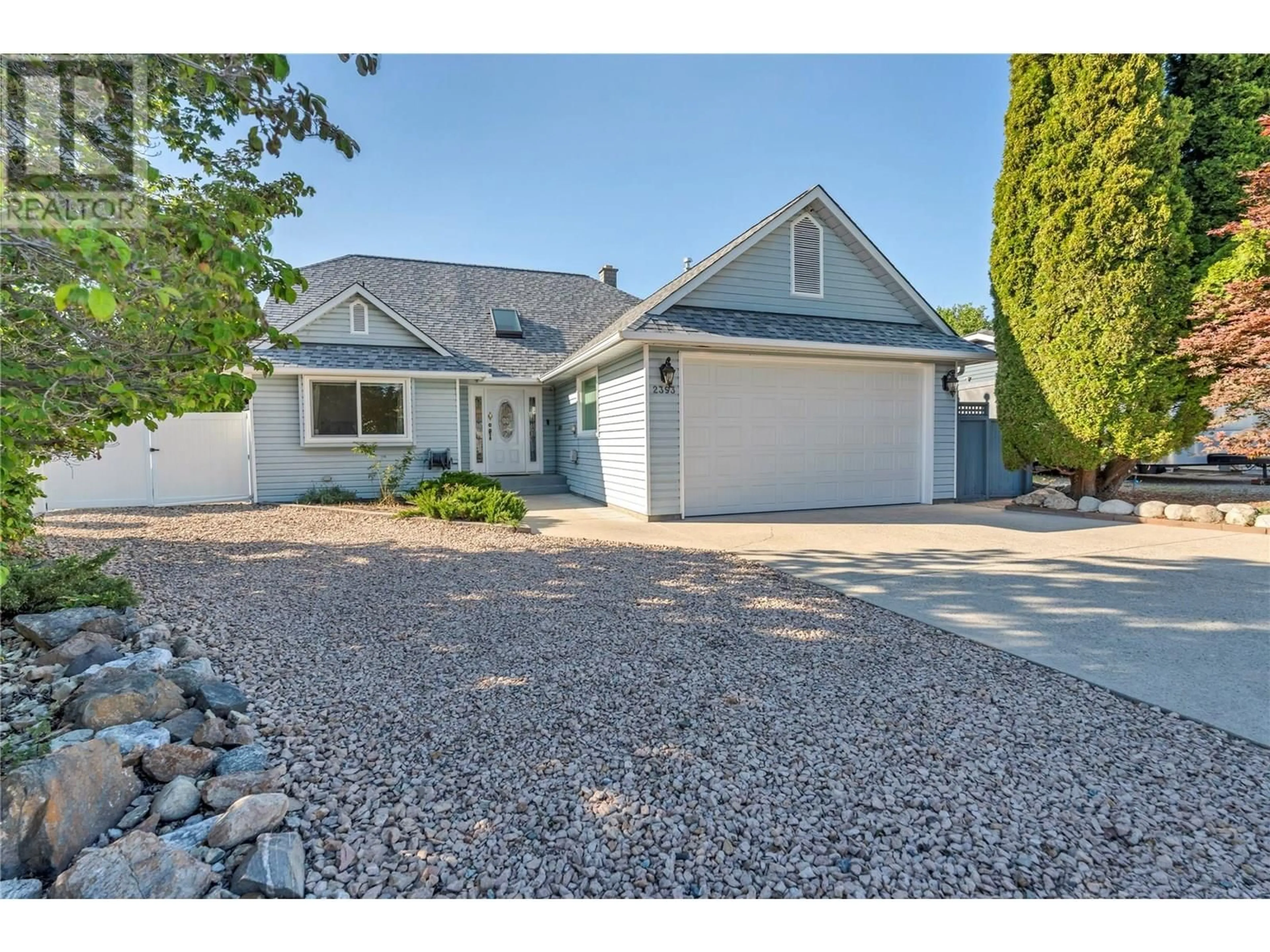 Home with vinyl exterior material, street for 2393 CORNWALL DRIVE, Penticton British Columbia V2A6R6
