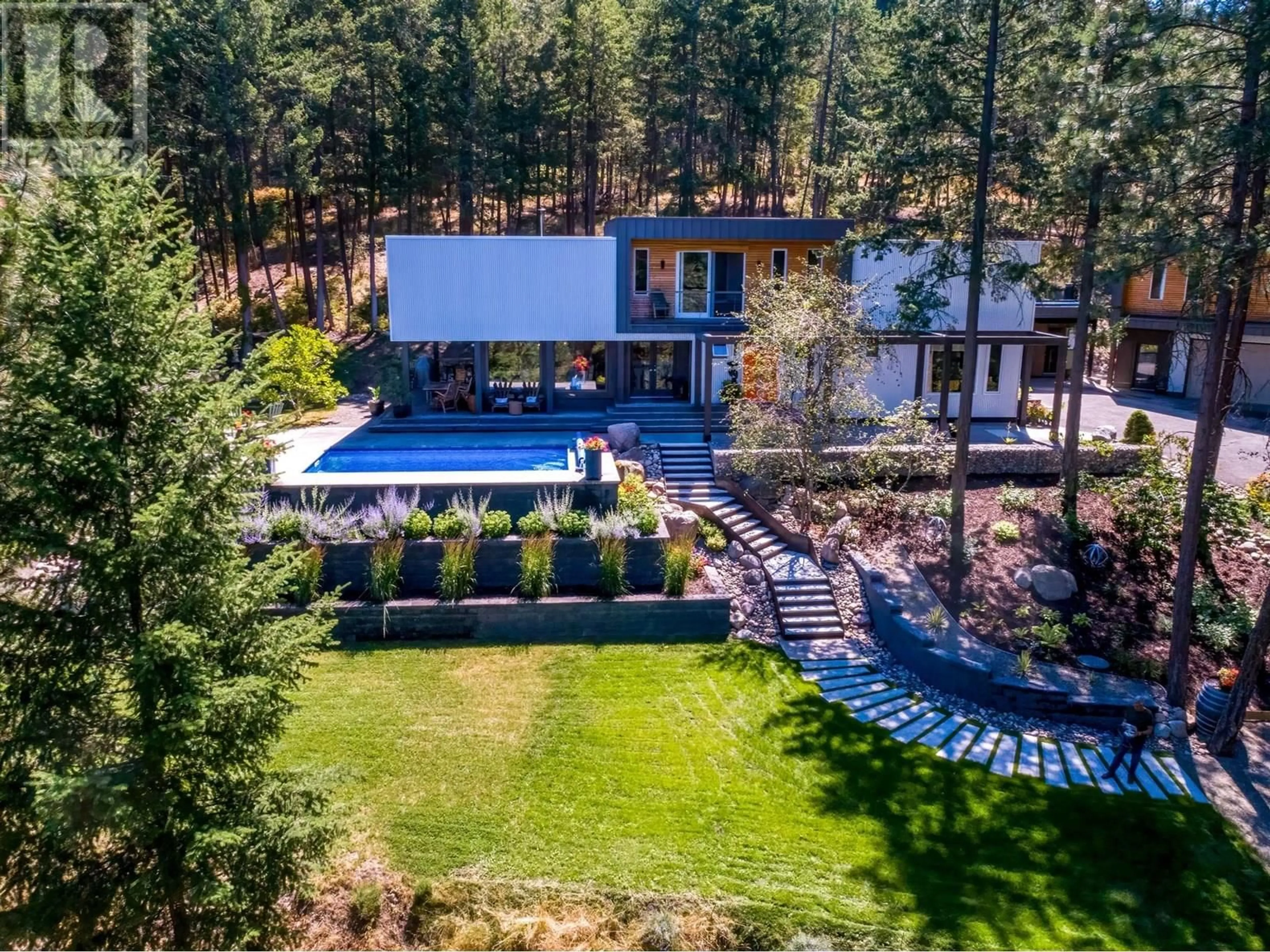 A pic from outside/outdoor area/front of a property/back of a property/a pic from drone, forest/trees view for 16355 BARKLEY ROAD, Lake Country British Columbia V4V1B4