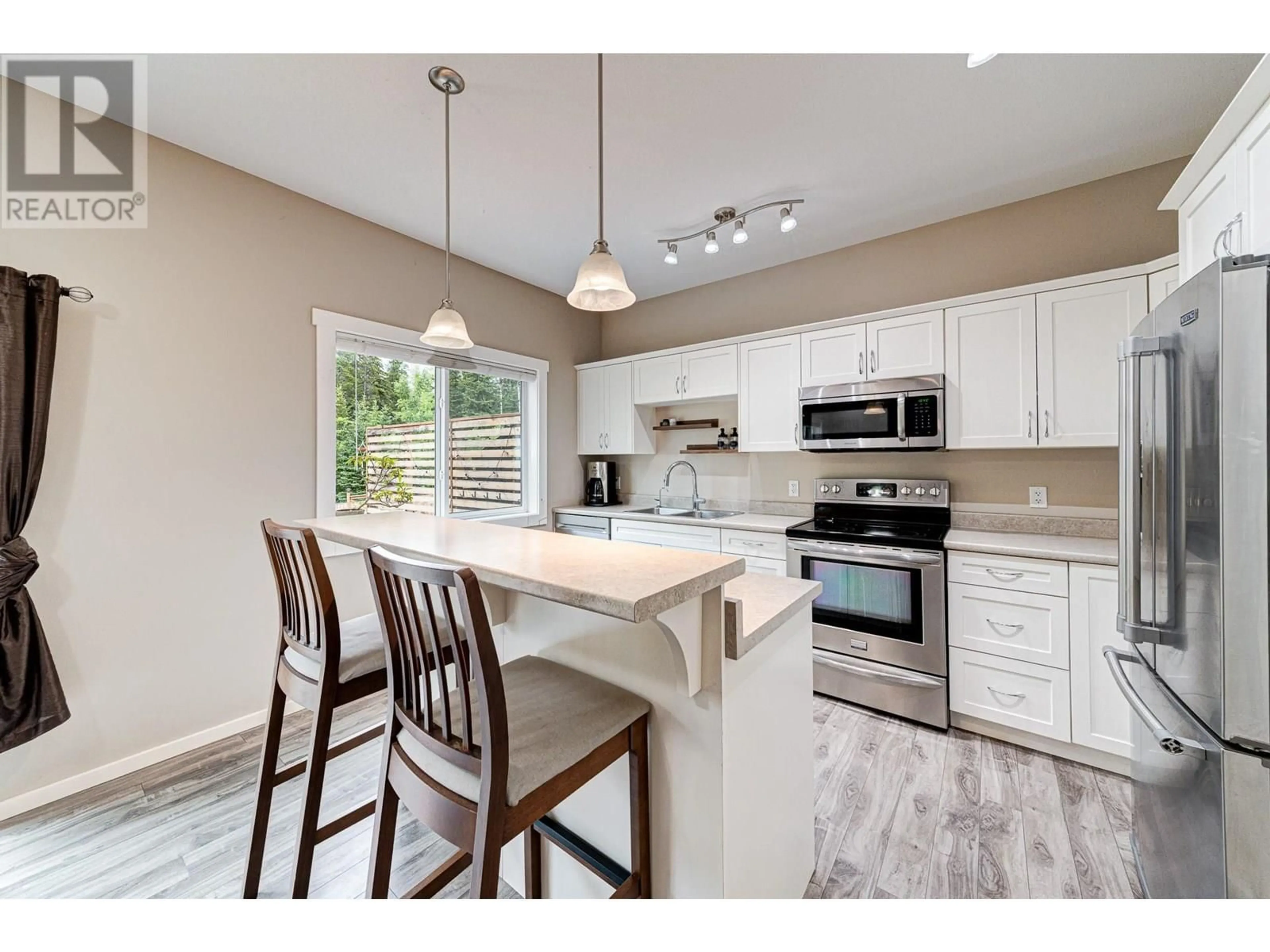 Open concept kitchen, unknown for 1319 CHERRYWOOD BOULEVARD, Sparwood British Columbia V0B2G2