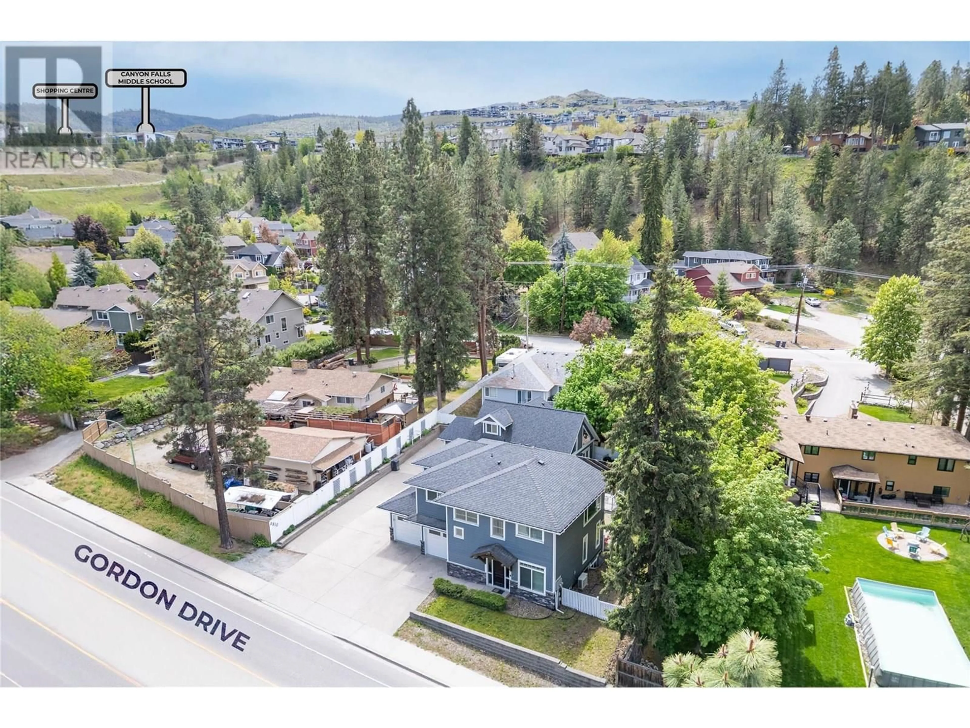 A pic from outside/outdoor area/front of a property/back of a property/a pic from drone, mountain view for 4810 GORDON DRIVE, Kelowna British Columbia V1W4P3
