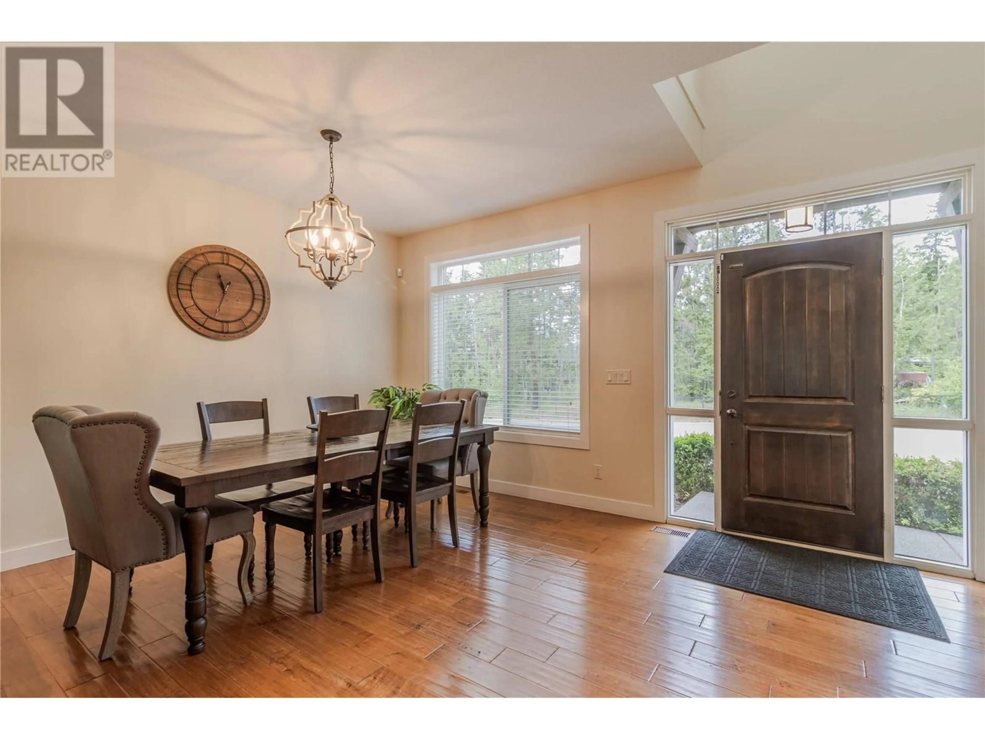 Dining room, wood/laminate floor for 4810 GORDON DRIVE, Kelowna British Columbia V1W4P3