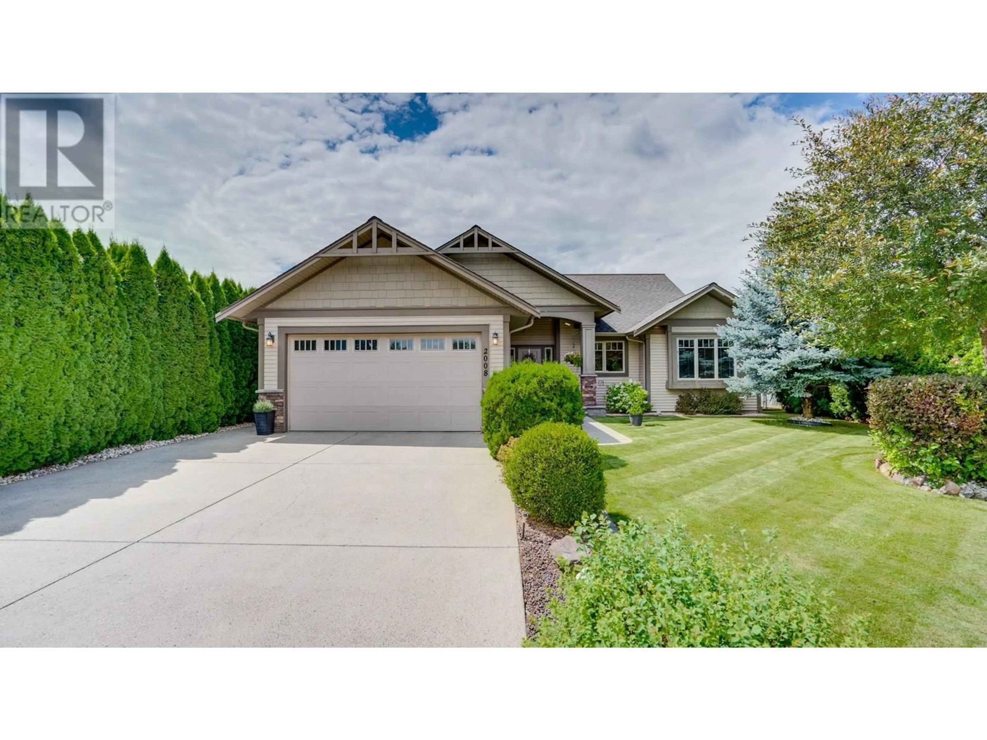 Home with vinyl exterior material, street for 2008 WATERWHEEL STREET, Enderby British Columbia V0E1V2
