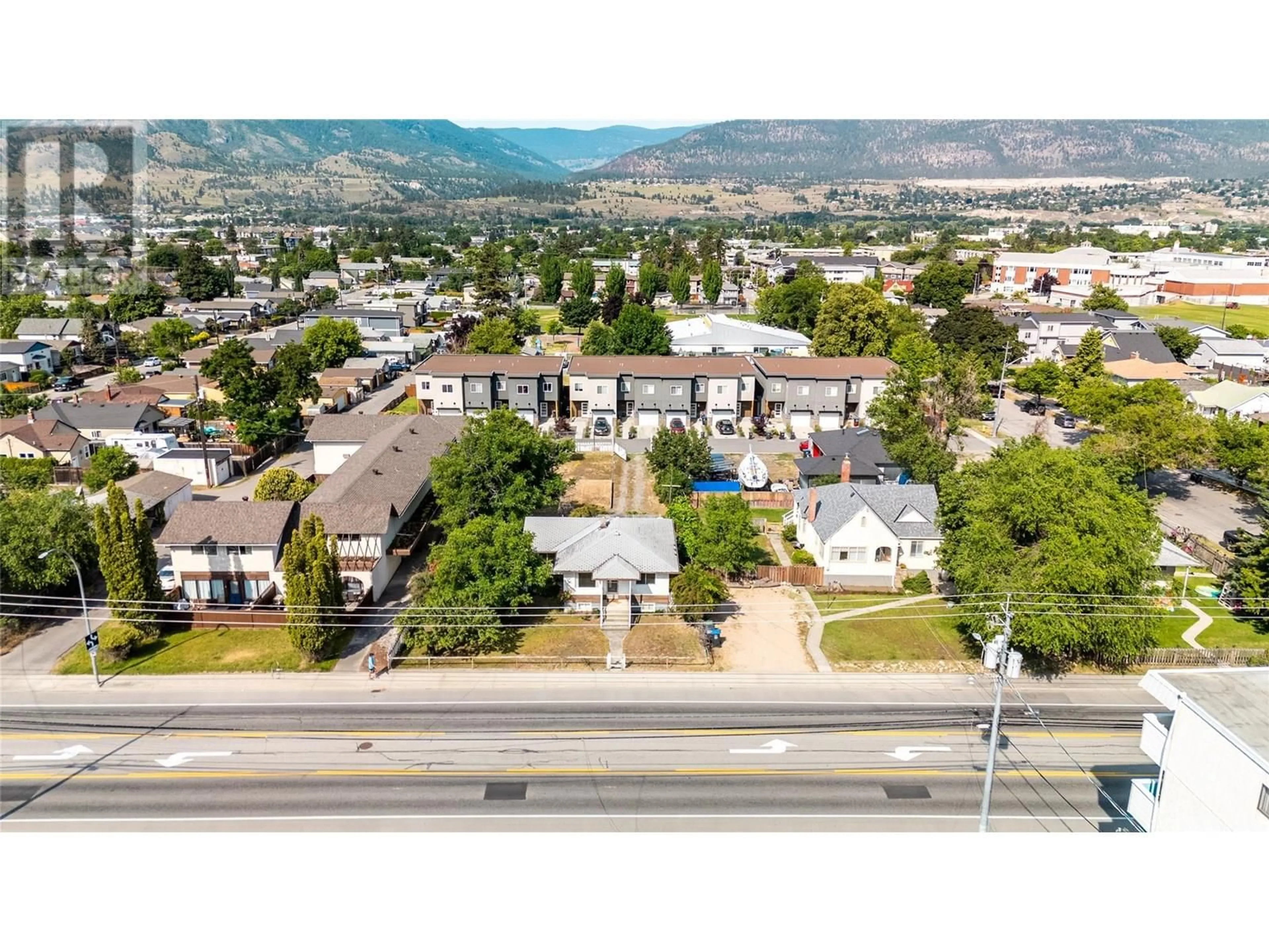 A pic from outside/outdoor area/front of a property/back of a property/a pic from drone, mountain view for 1049 GOVERNMENT STREET, Penticton British Columbia V2A4T9