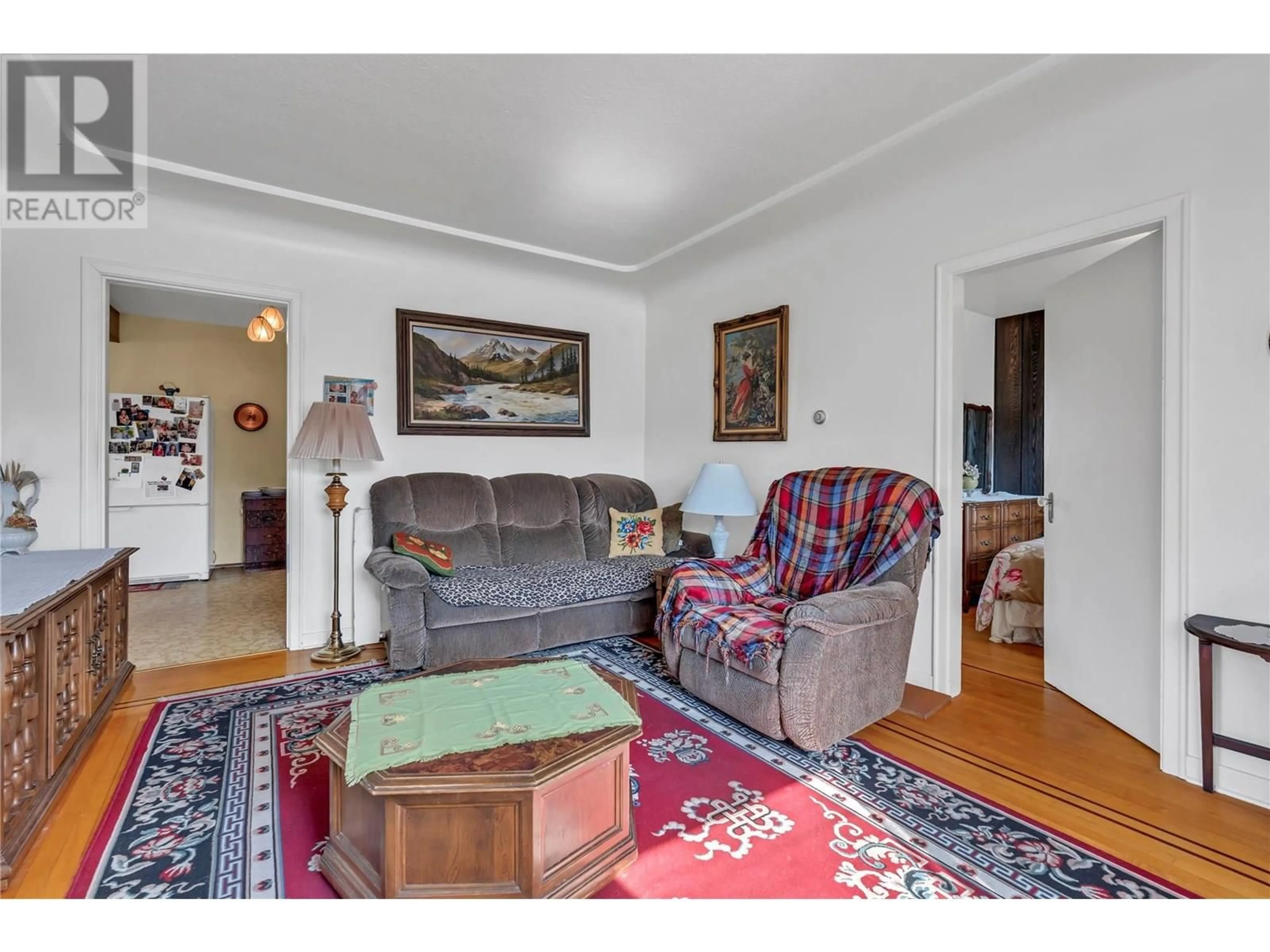 Living room with furniture, unknown for 1049 GOVERNMENT STREET, Penticton British Columbia V2A4T9