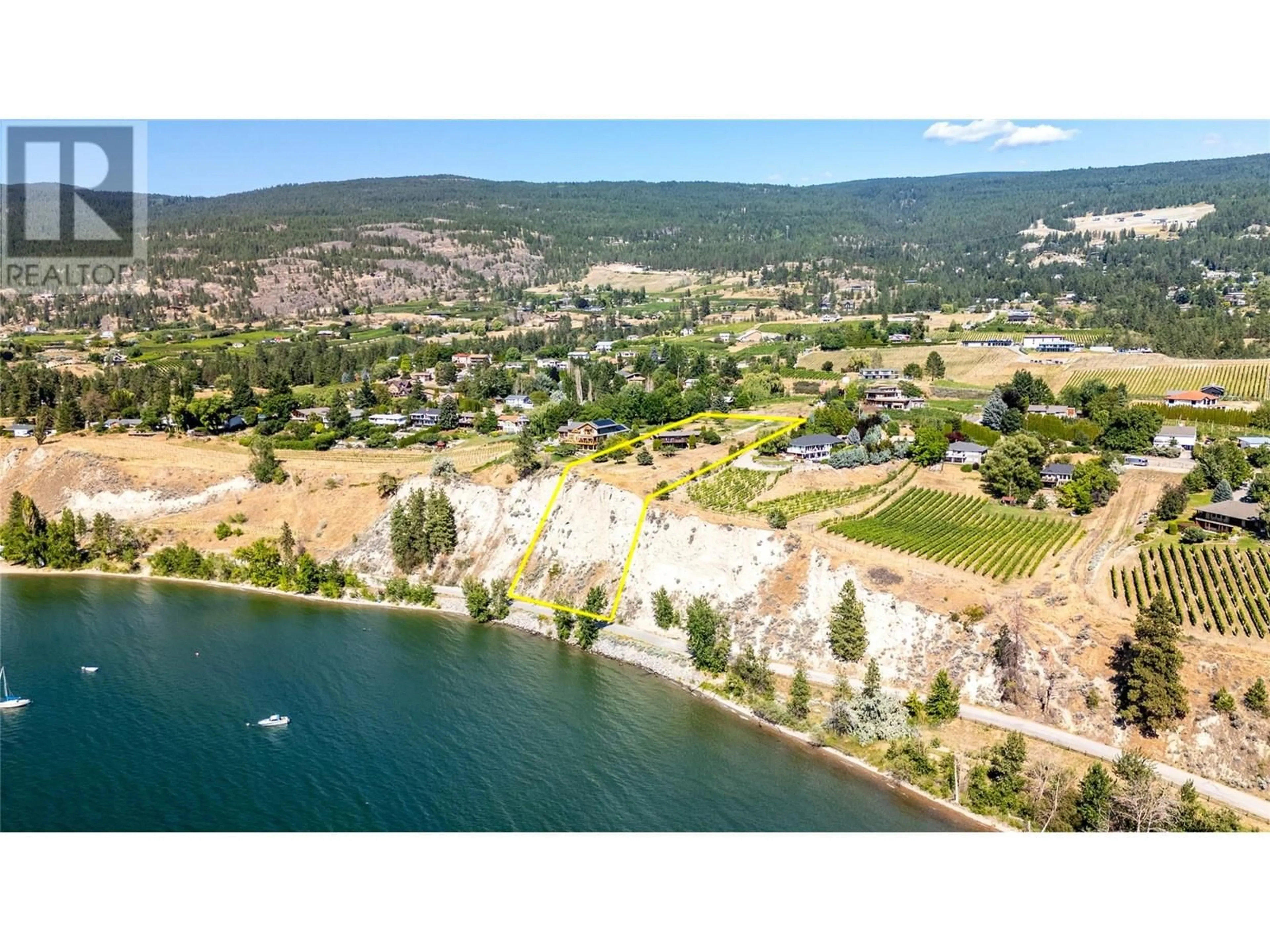 A pic from outside/outdoor area/front of a property/back of a property/a pic from drone, water/lake/river/ocean view for 3085 HAYMAN ROAD, Naramata British Columbia V0H1N1