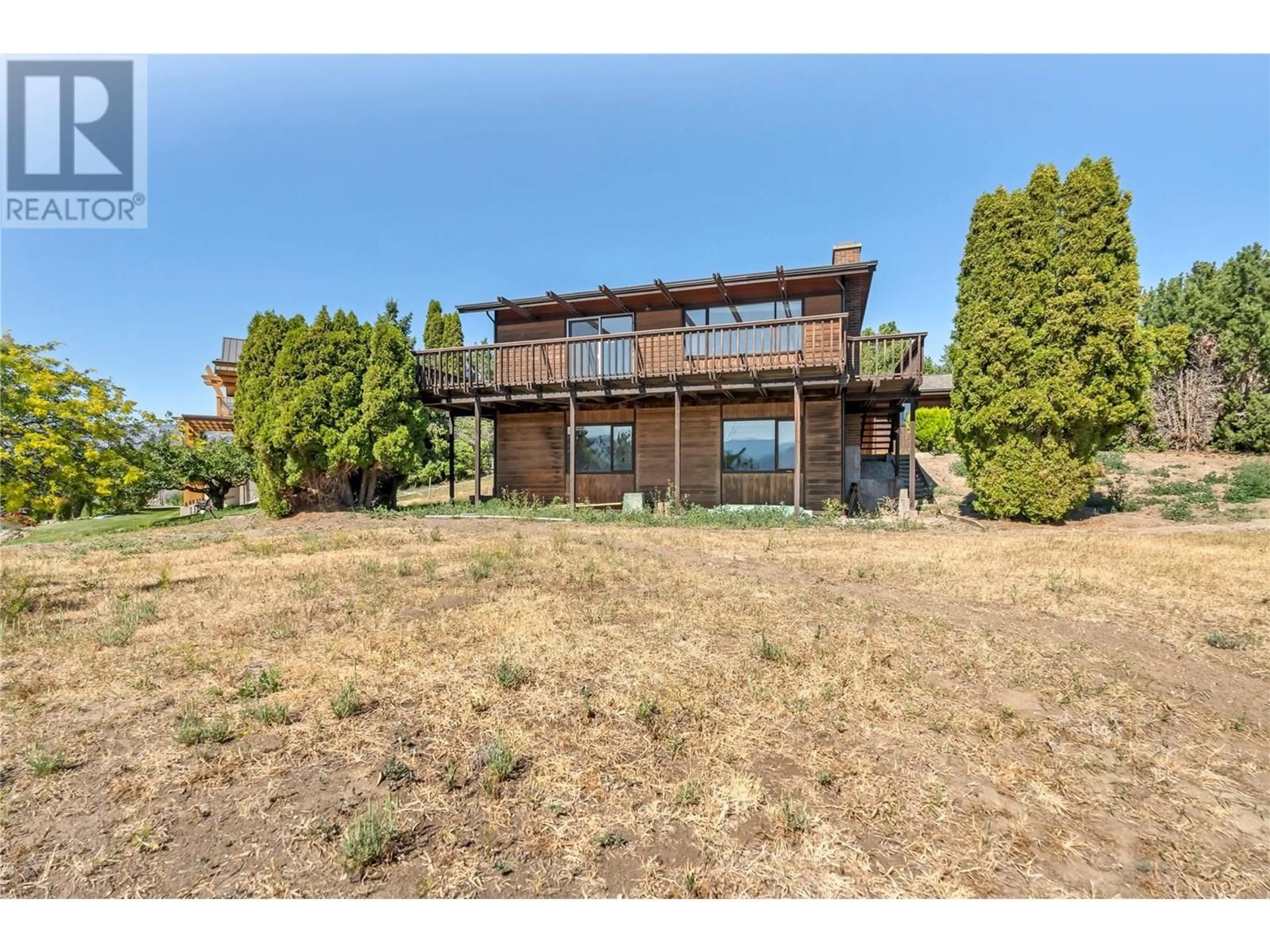 A pic from outside/outdoor area/front of a property/back of a property/a pic from drone, unknown for 3085 HAYMAN ROAD, Naramata British Columbia V0H1N1
