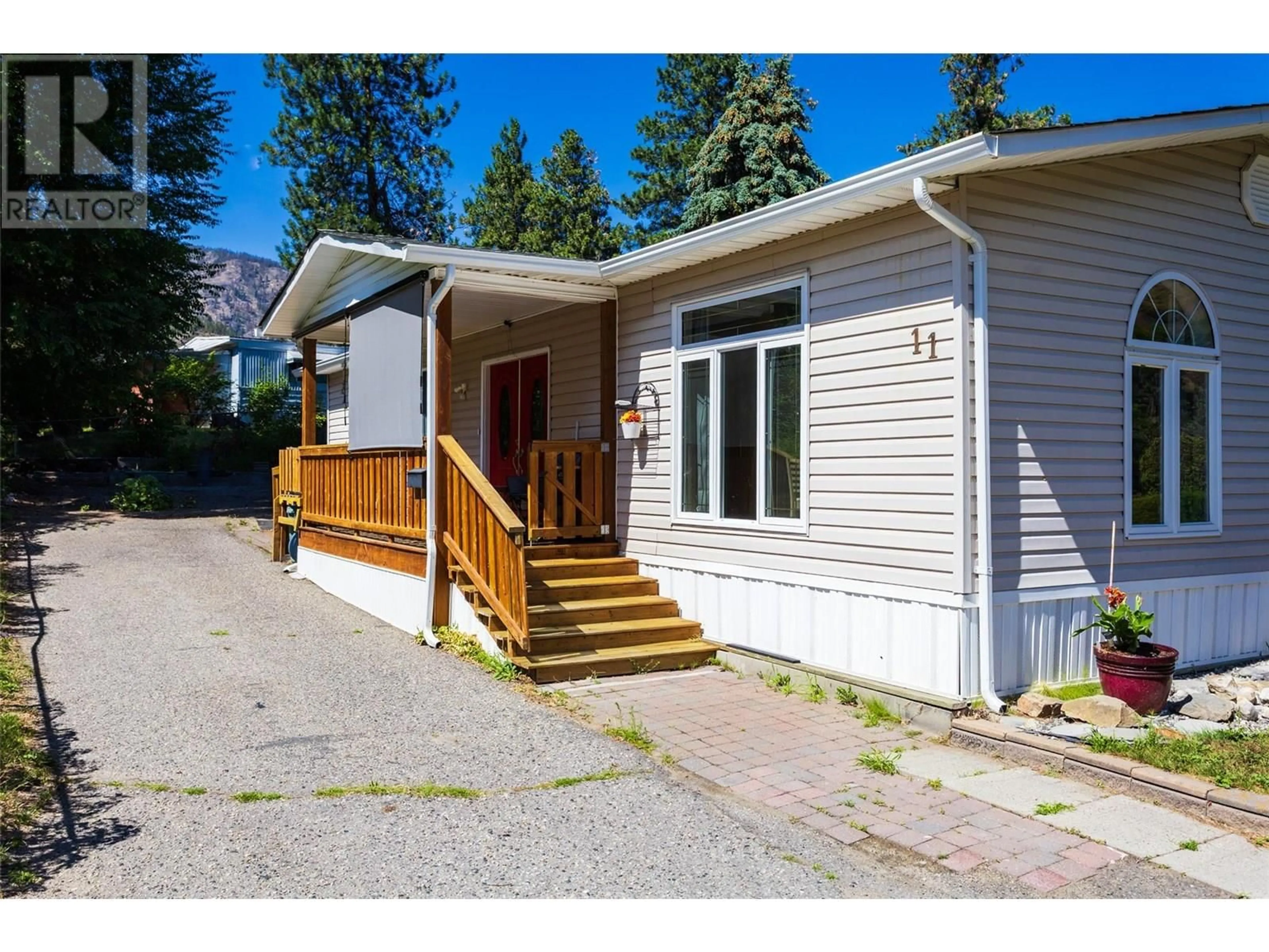 Home with vinyl exterior material, street for 11 - 1999 HIGHWAY 97 SOUTH OTHER, West Kelowna British Columbia V1Z1B2