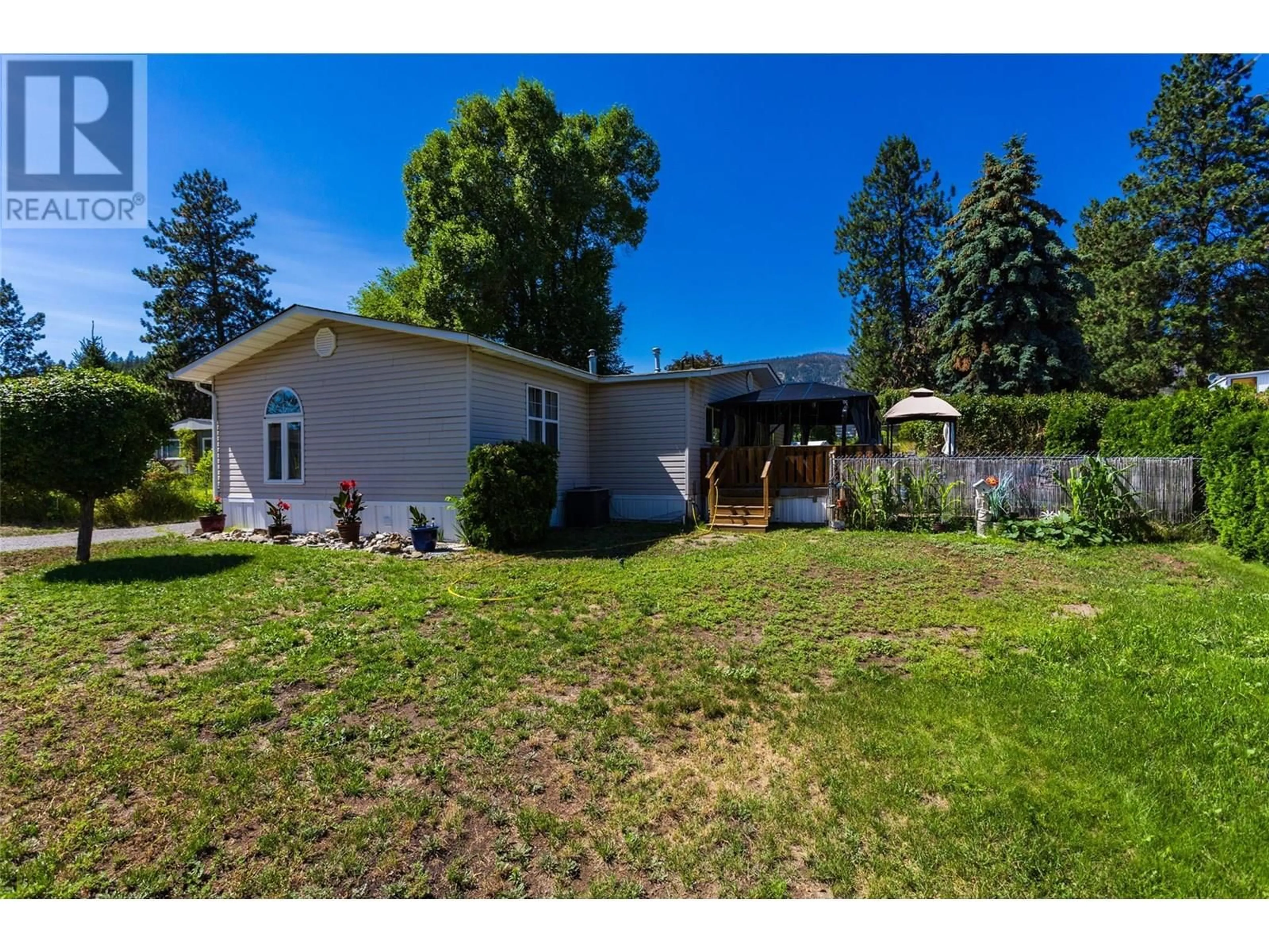 A pic from outside/outdoor area/front of a property/back of a property/a pic from drone, unknown for 11 - 1999 HIGHWAY 97 SOUTH OTHER, West Kelowna British Columbia V1Z1B2