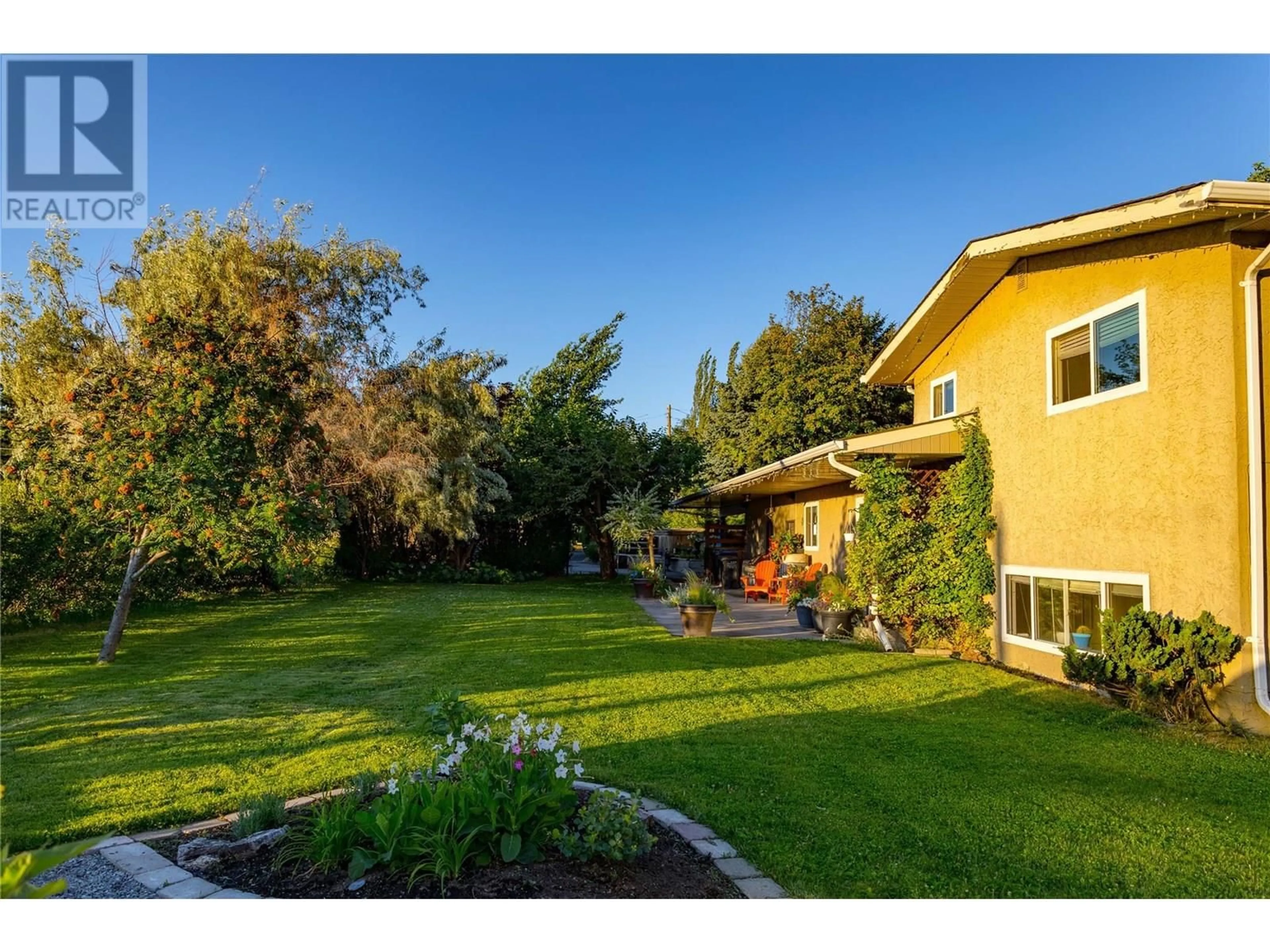 A pic from outside/outdoor area/front of a property/back of a property/a pic from drone, street for 2351 GALLAGHER ROAD, Kelowna British Columbia V1P1G9