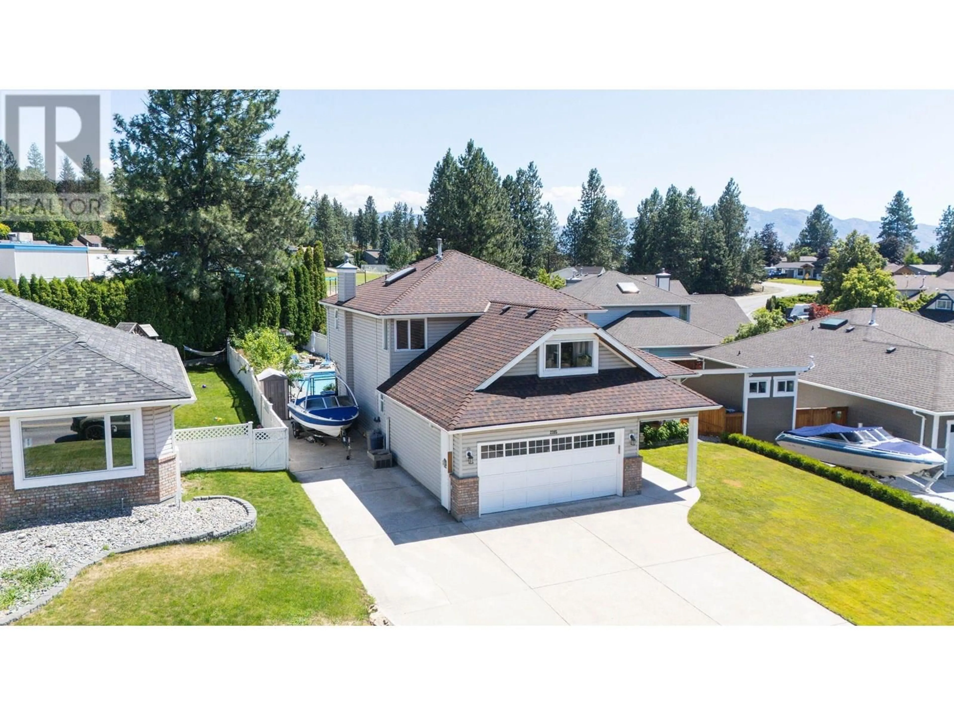 A pic from outside/outdoor area/front of a property/back of a property/a pic from drone, mountain view for 2395 SHANNON RIDGE DRIVE, West Kelowna British Columbia V4T1T1