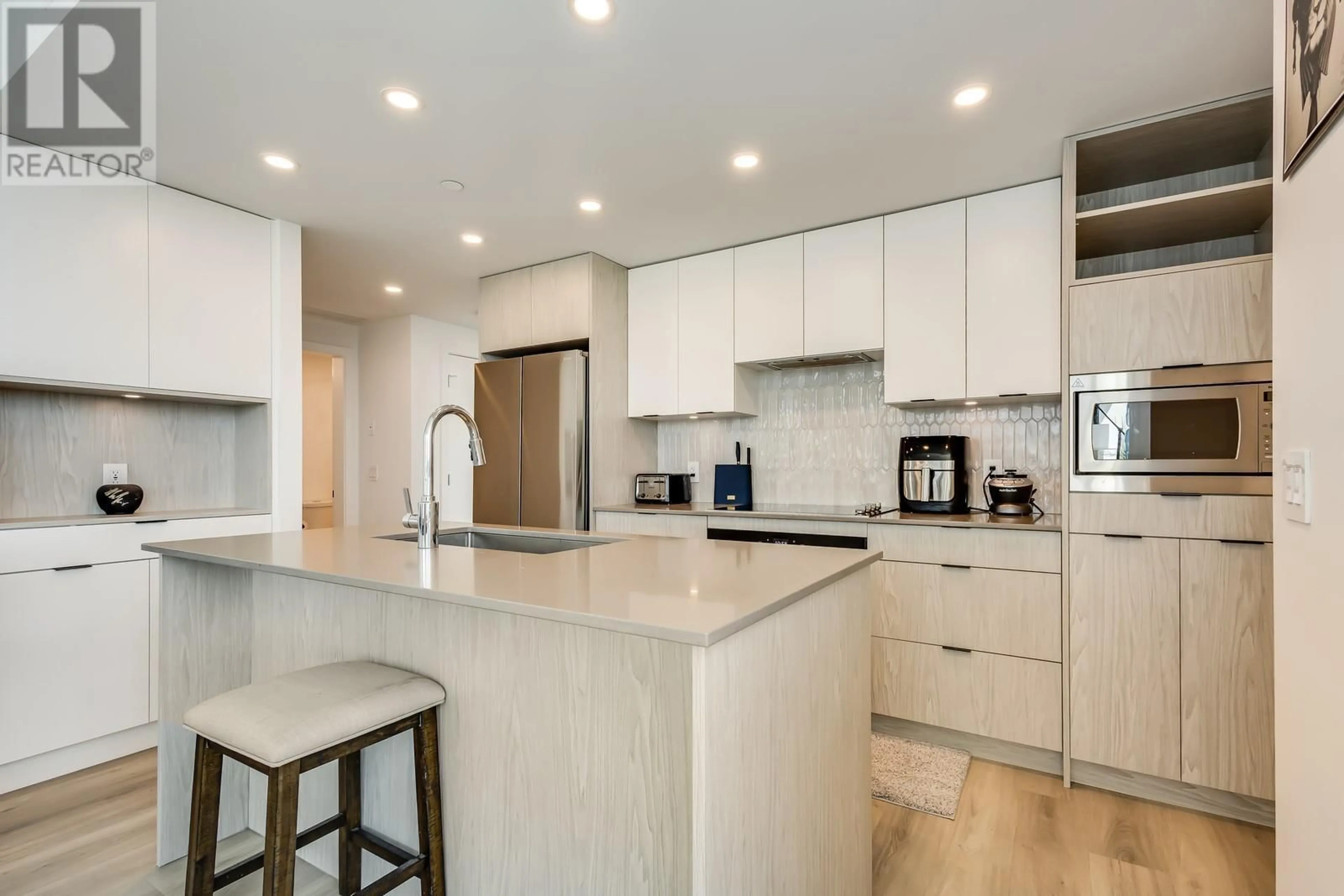 Contemporary kitchen, ceramic/tile floor for 2502 - 1488 BERTRAM STREET, Kelowna British Columbia V1Y0M6