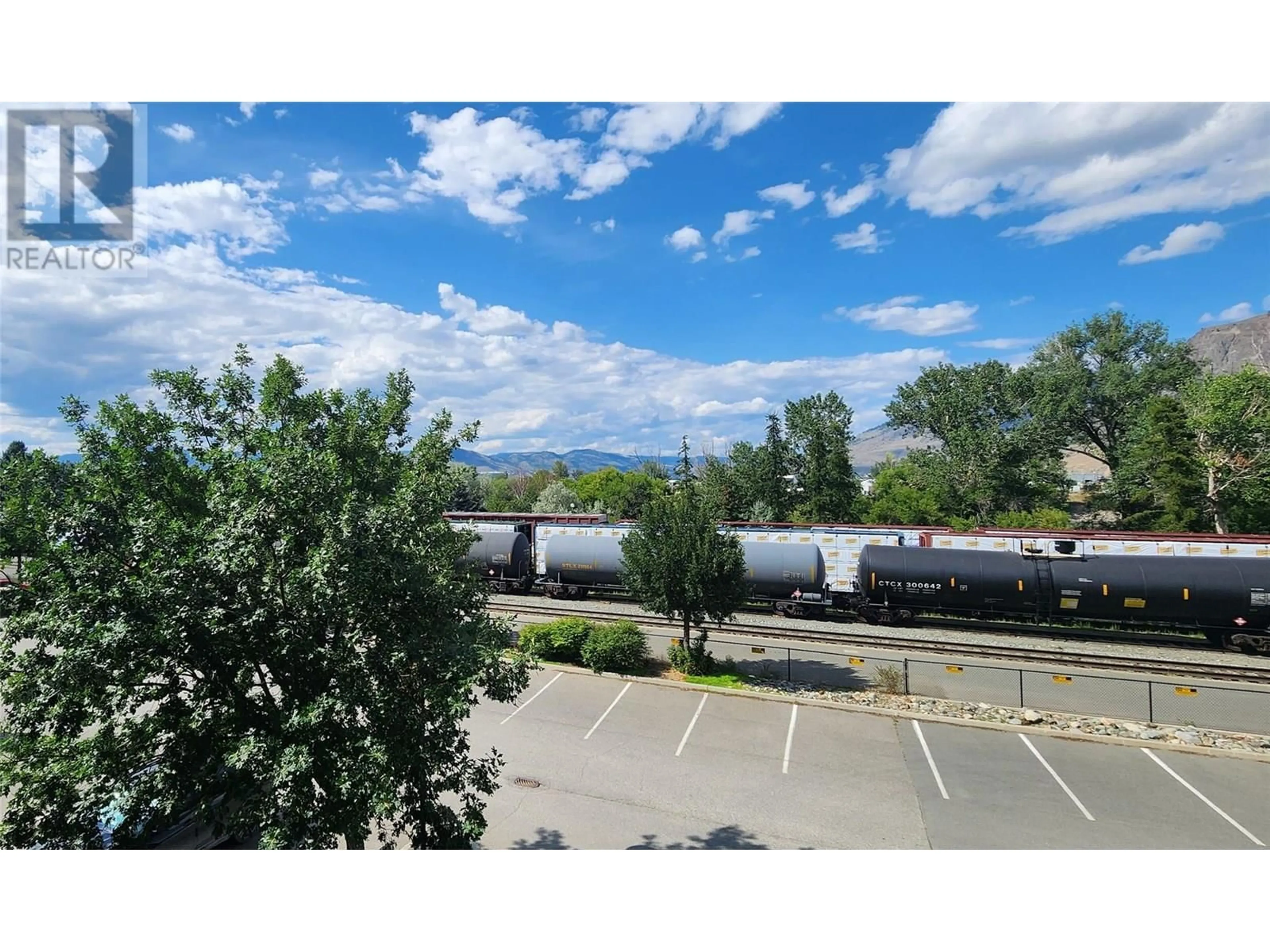 A pic from outside/outdoor area/front of a property/back of a property/a pic from drone, mountain view for 102 - 568 LORNE STREET, Kamloops British Columbia V2C1W3