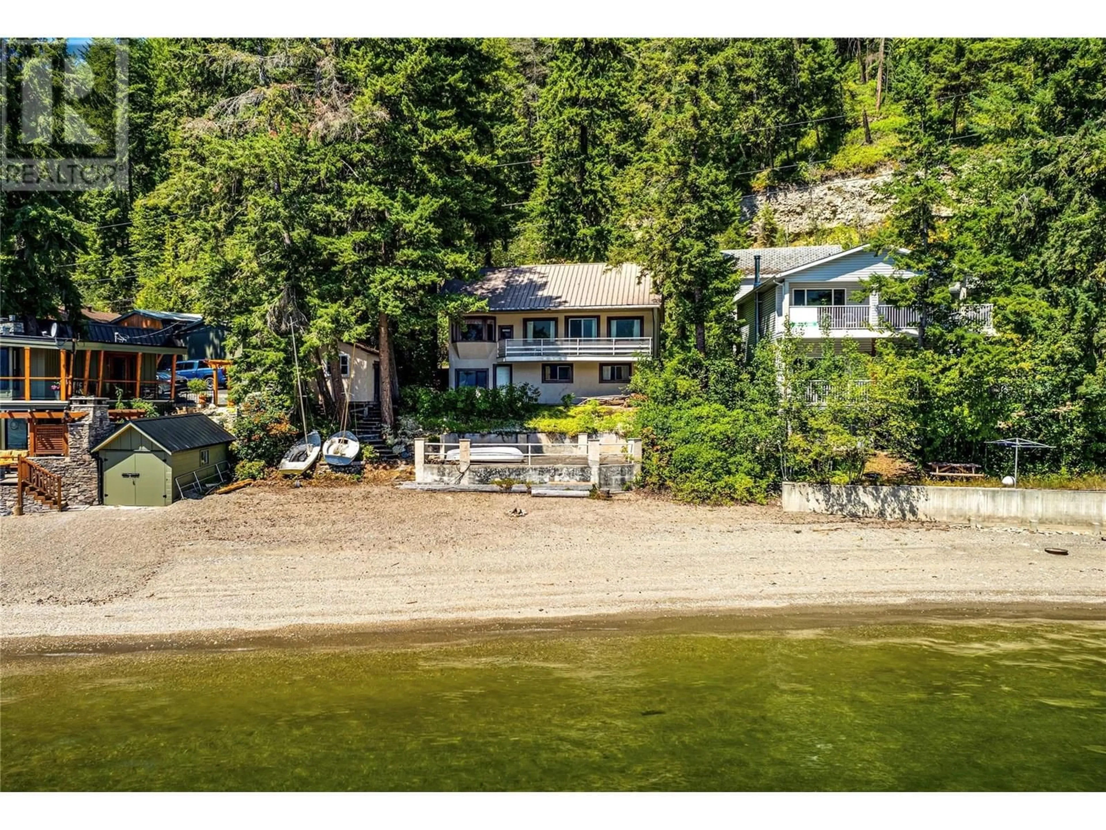 A pic from outside/outdoor area/front of a property/back of a property/a pic from drone, water/lake/river/ocean view for 4742 SUNNYBRAE CANOE POINT ROAD, Tappen British Columbia V0E2X1