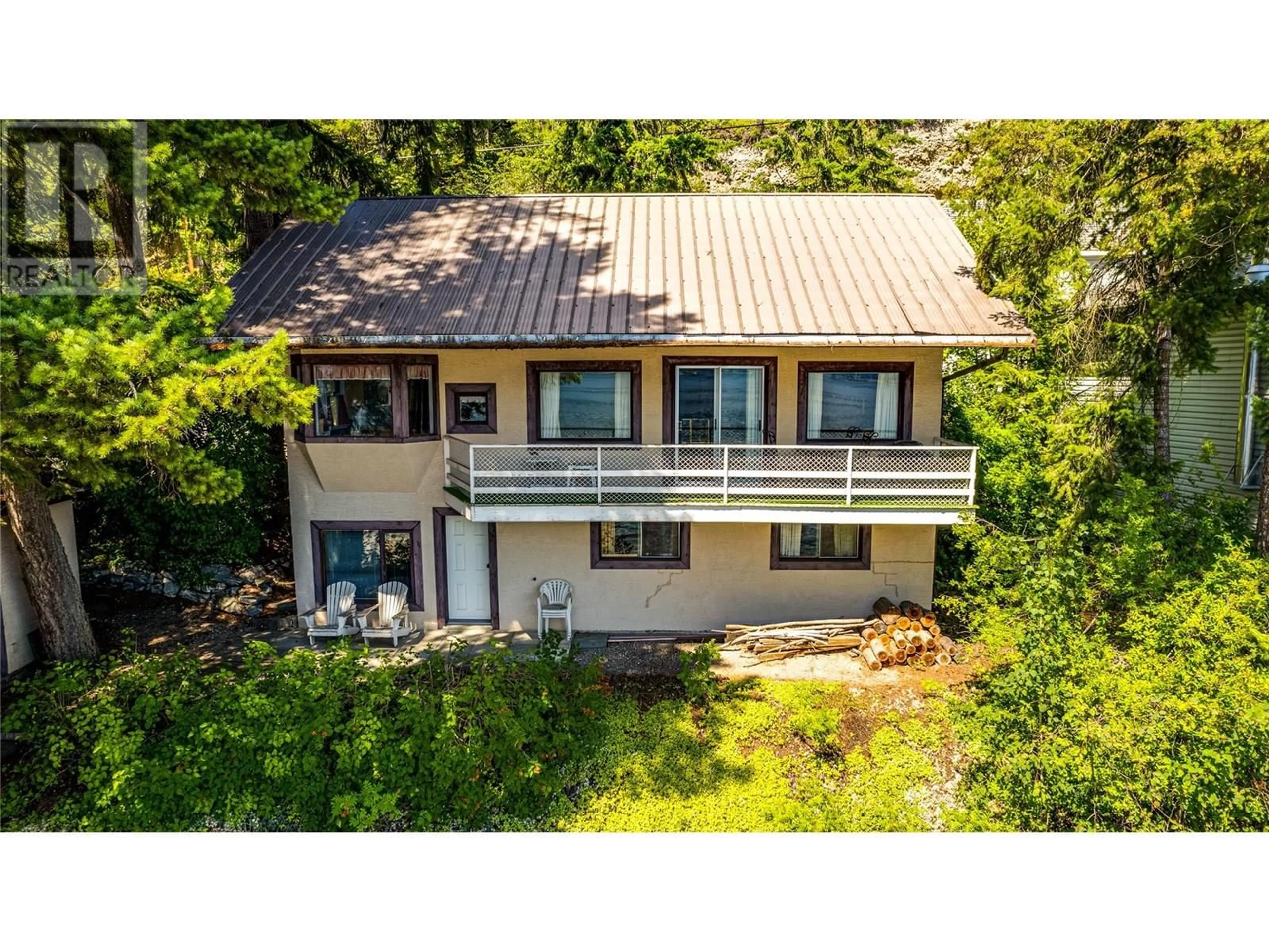 A pic from outside/outdoor area/front of a property/back of a property/a pic from drone, building for 4742 SUNNYBRAE CANOE POINT ROAD, Tappen British Columbia V0E2X1