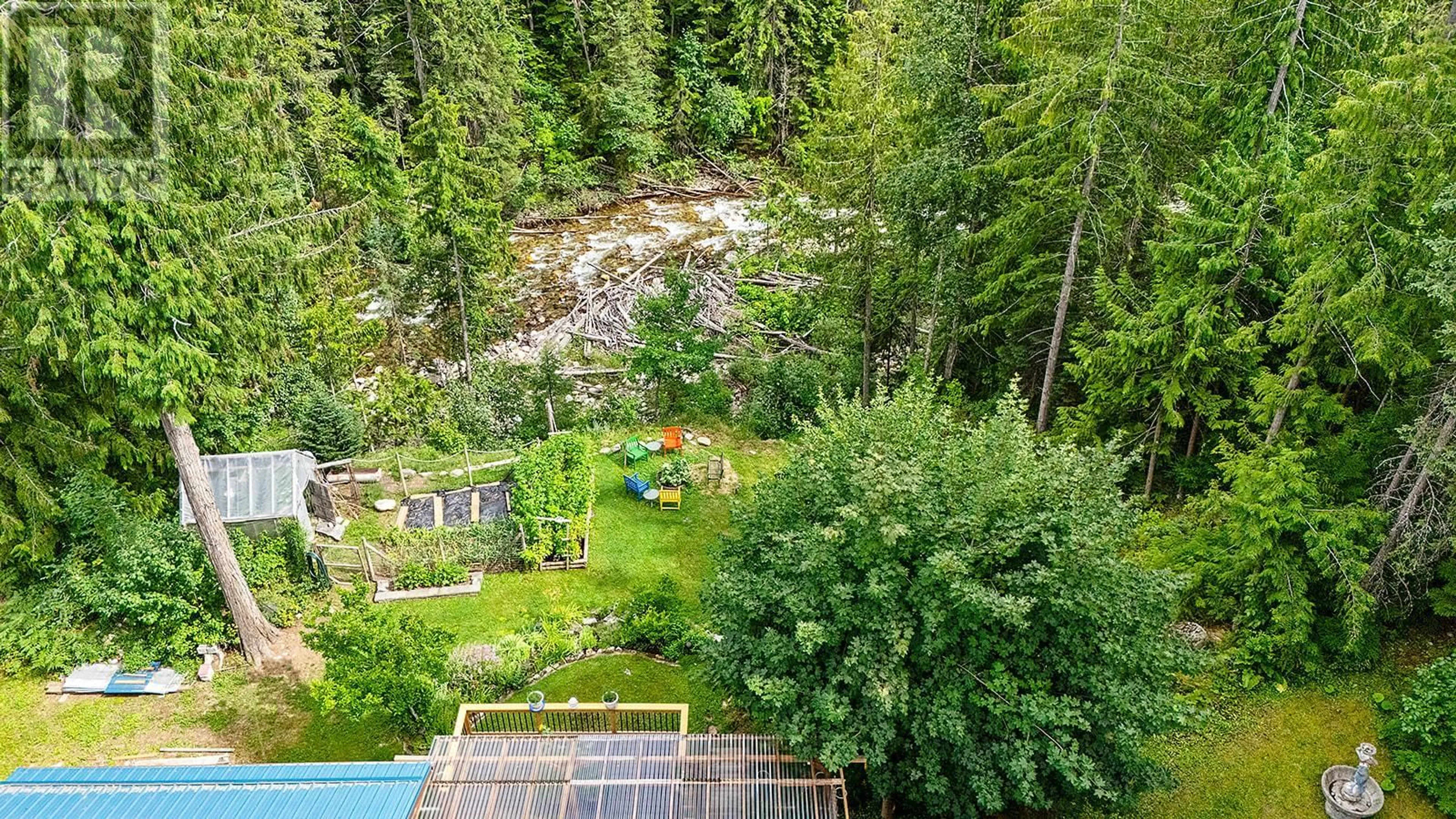 A pic from outside/outdoor area/front of a property/back of a property/a pic from drone, forest/trees view for 16324 BOWE ROAD, Crawford Bay British Columbia V0B1E0