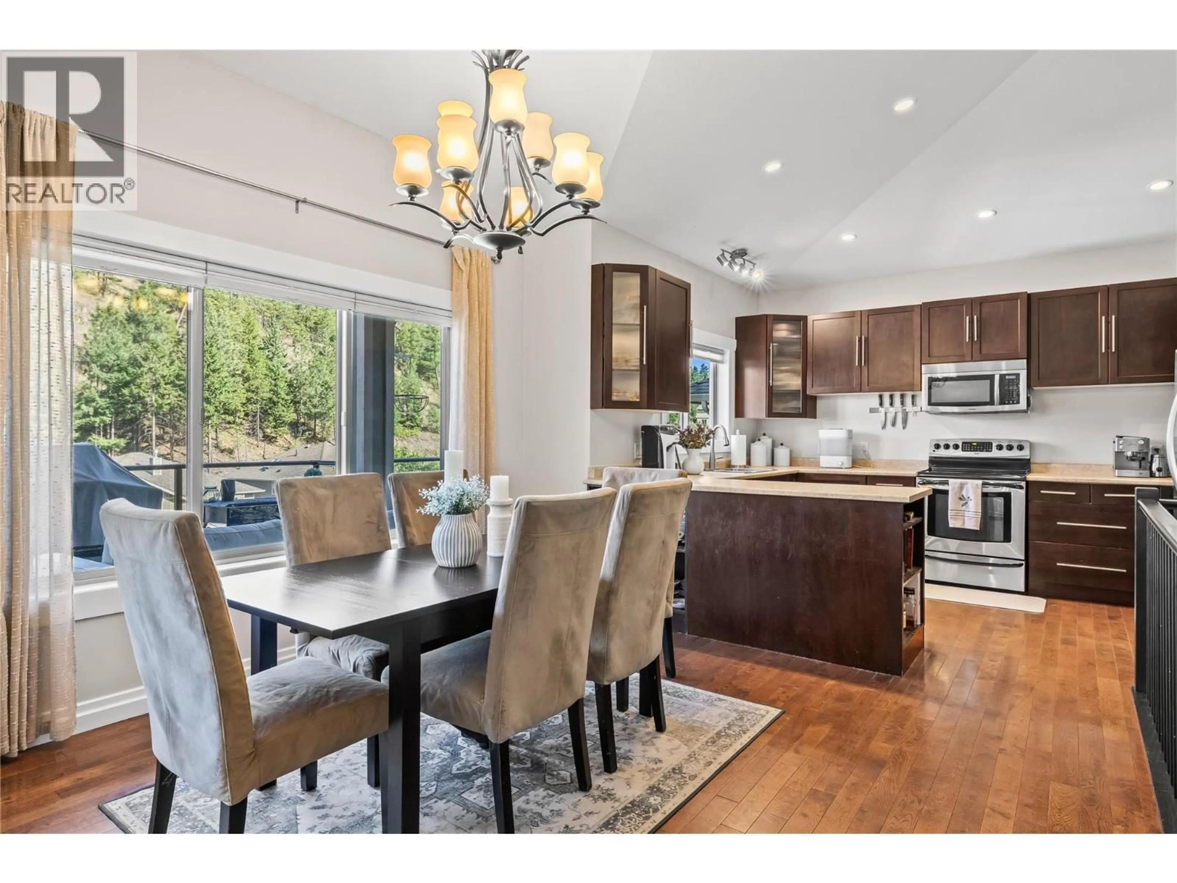 Open concept kitchen, wood/laminate floor for 2223 SUNVIEW DRIVE, West Kelowna British Columbia V1Z4B9
